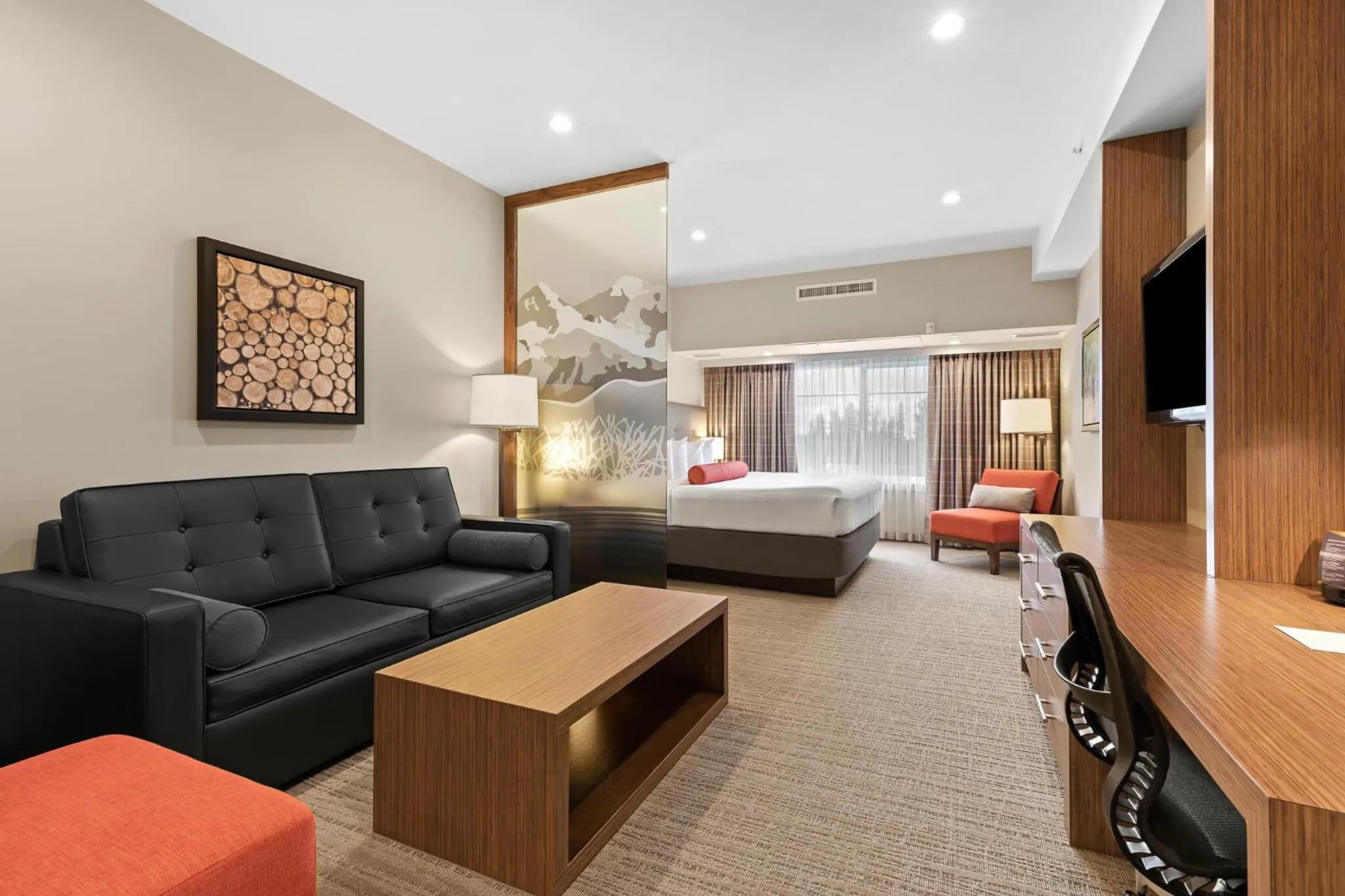 Bed in Mountain View Inn & Suites