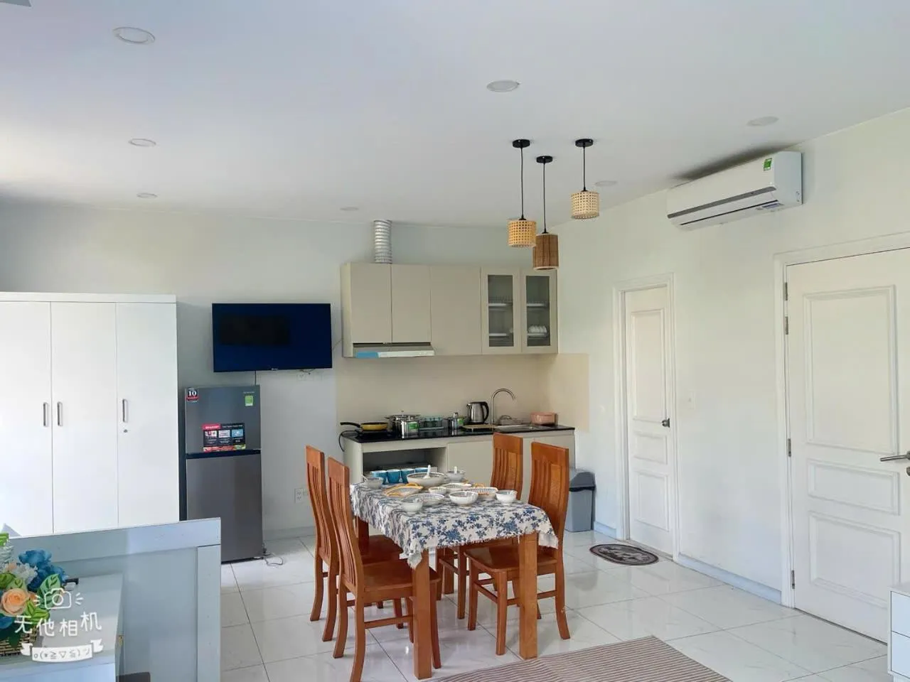 Kitchen or kitchenette in Ngân Hà Star Homestay - Grand World Phú Quốc