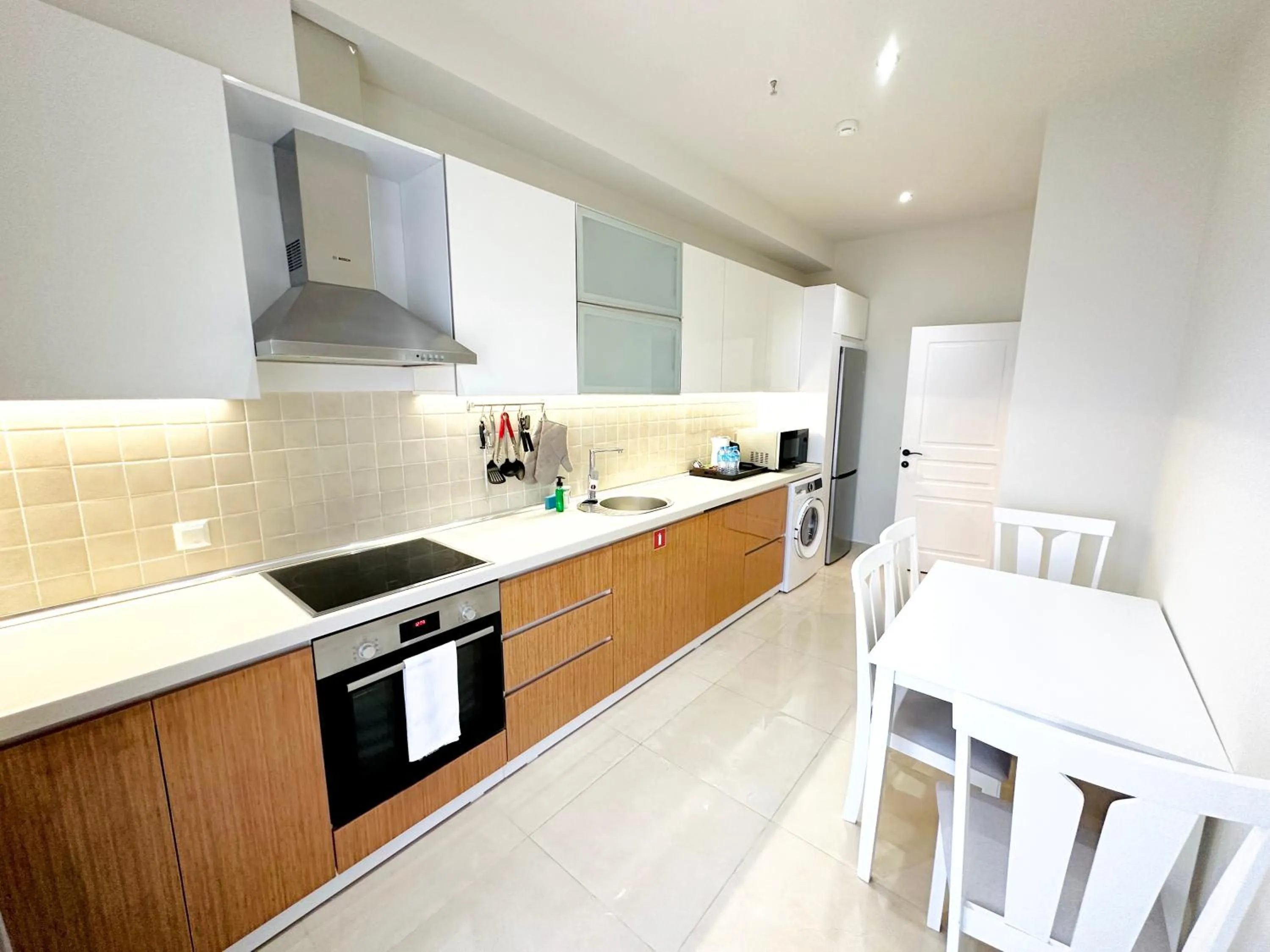 Kitchen or kitchenette in Somerset City Centre Atyrau