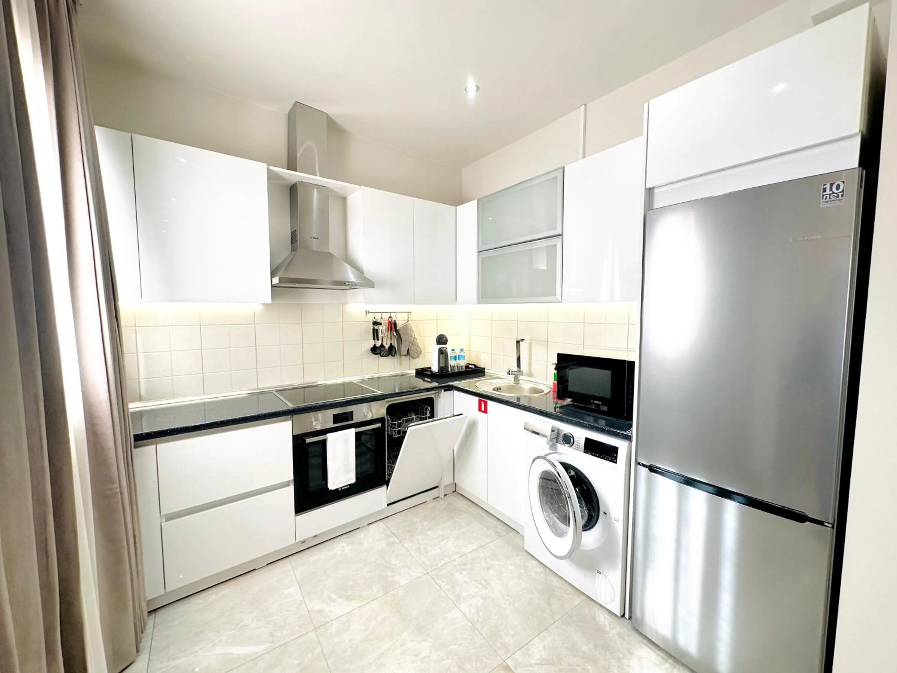 Kitchen or kitchenette in Somerset City Centre Atyrau