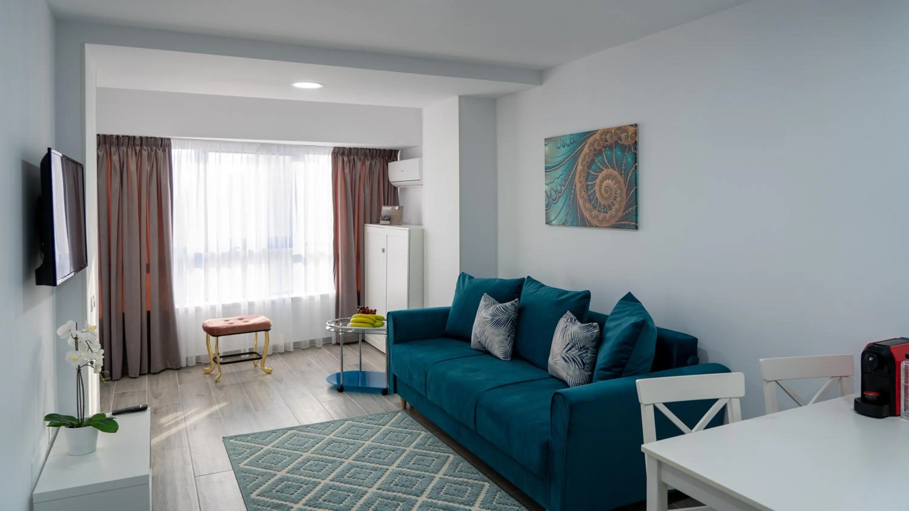 Seating area in Sea View Apartments Olimp - Avenue Hotels