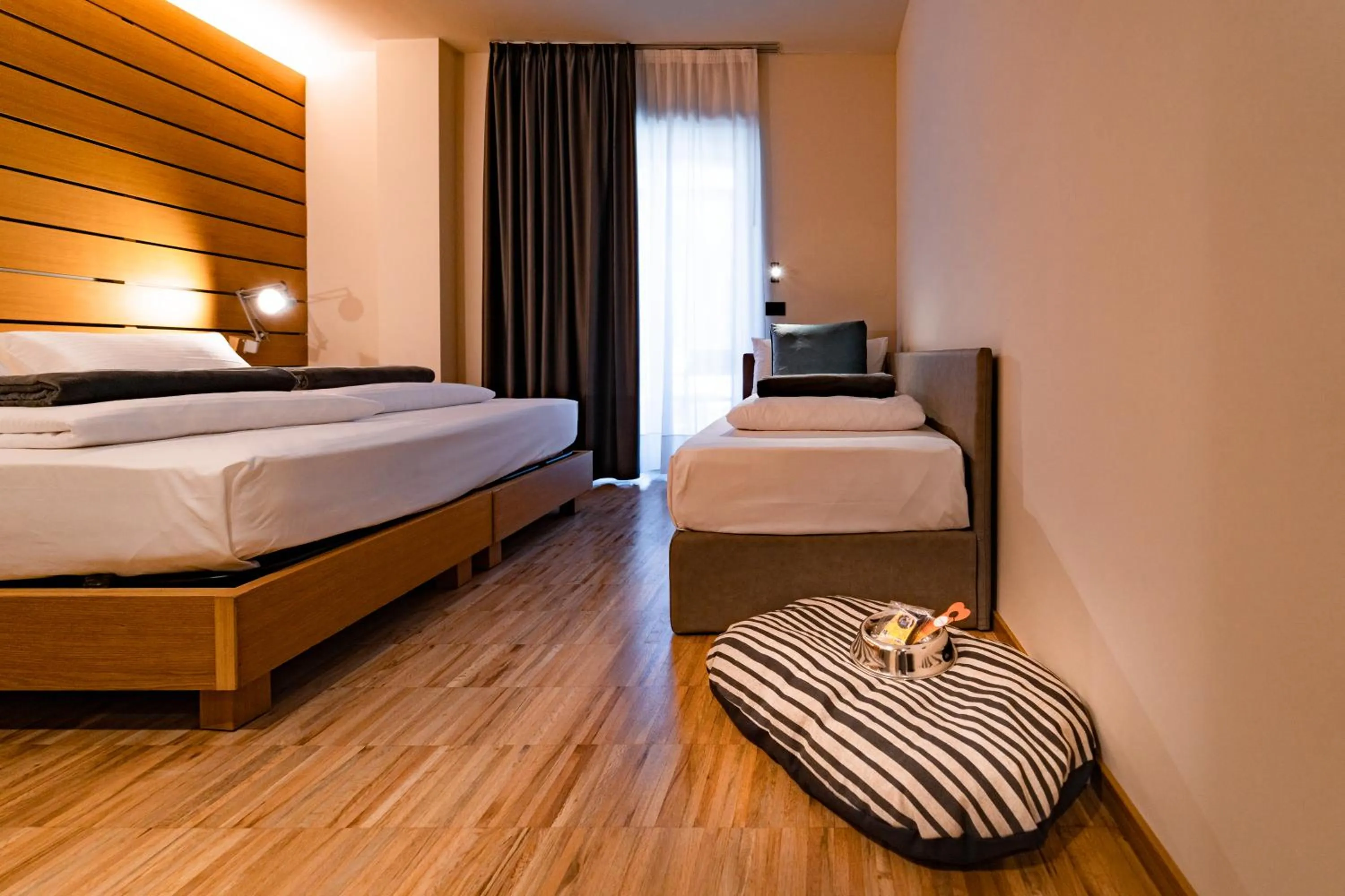 Bed in Lake Front Hotel Mirage