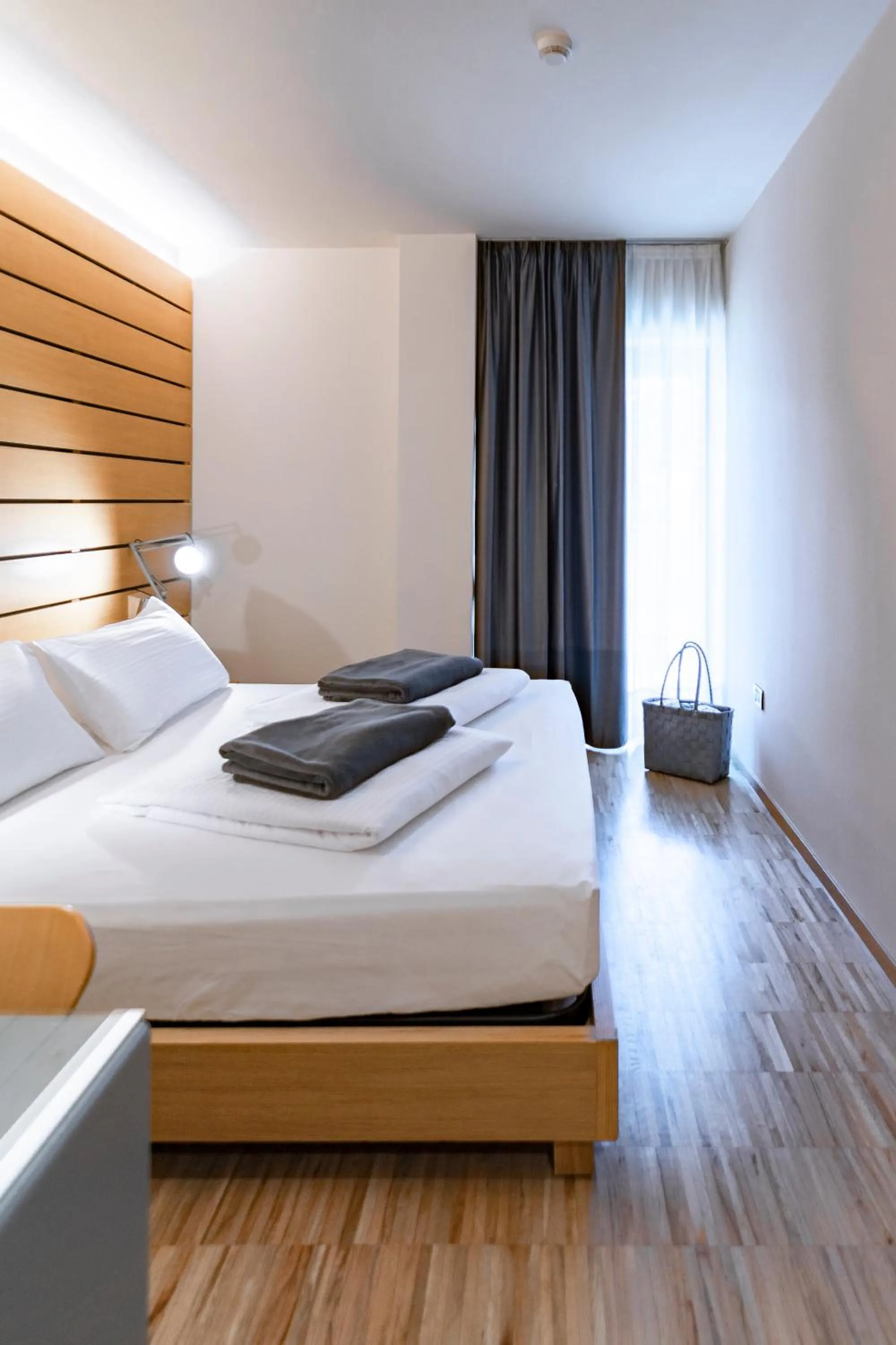 Bed in Lake Front Hotel Mirage