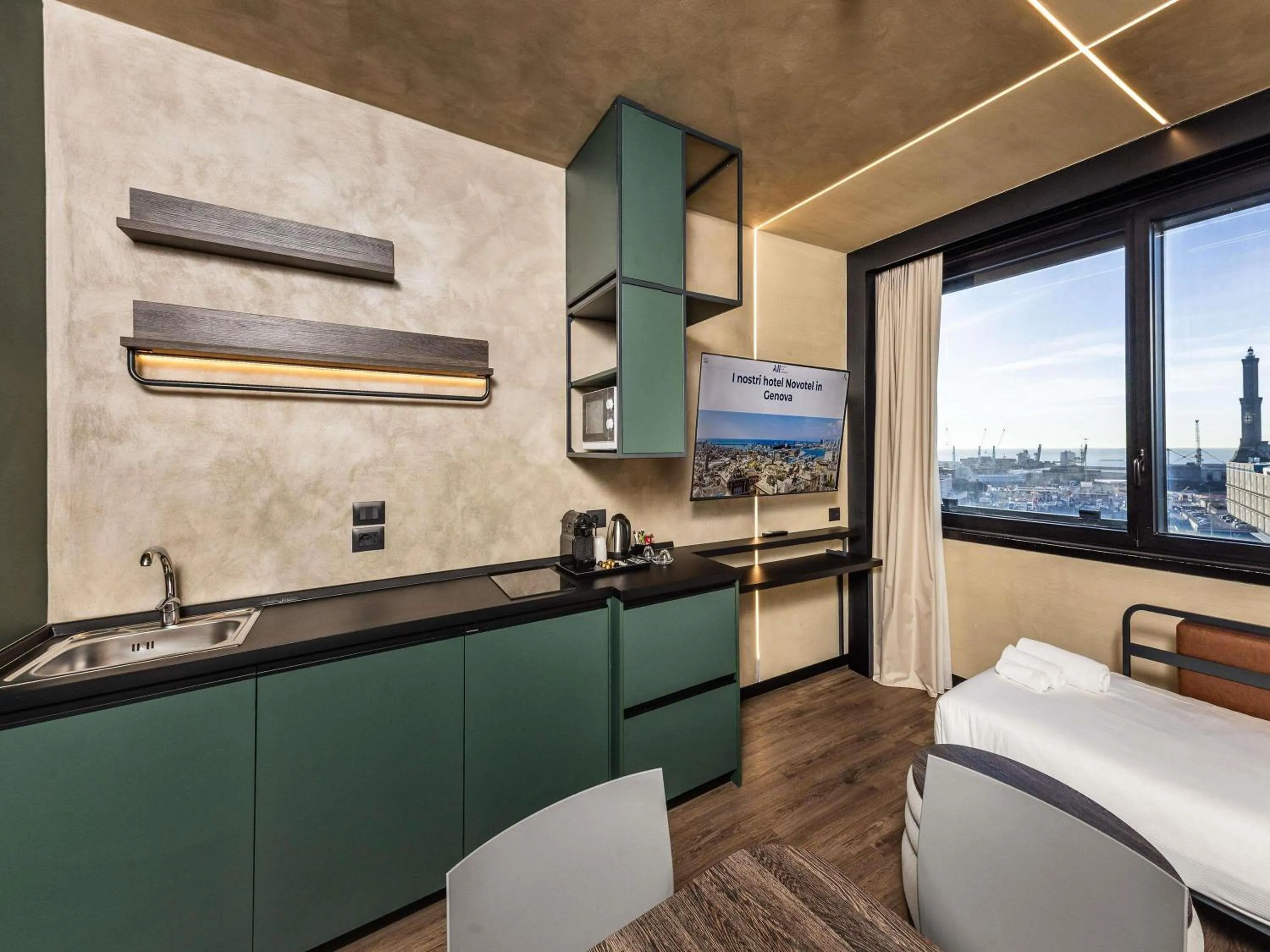 Bedroom in Novotel Genova City