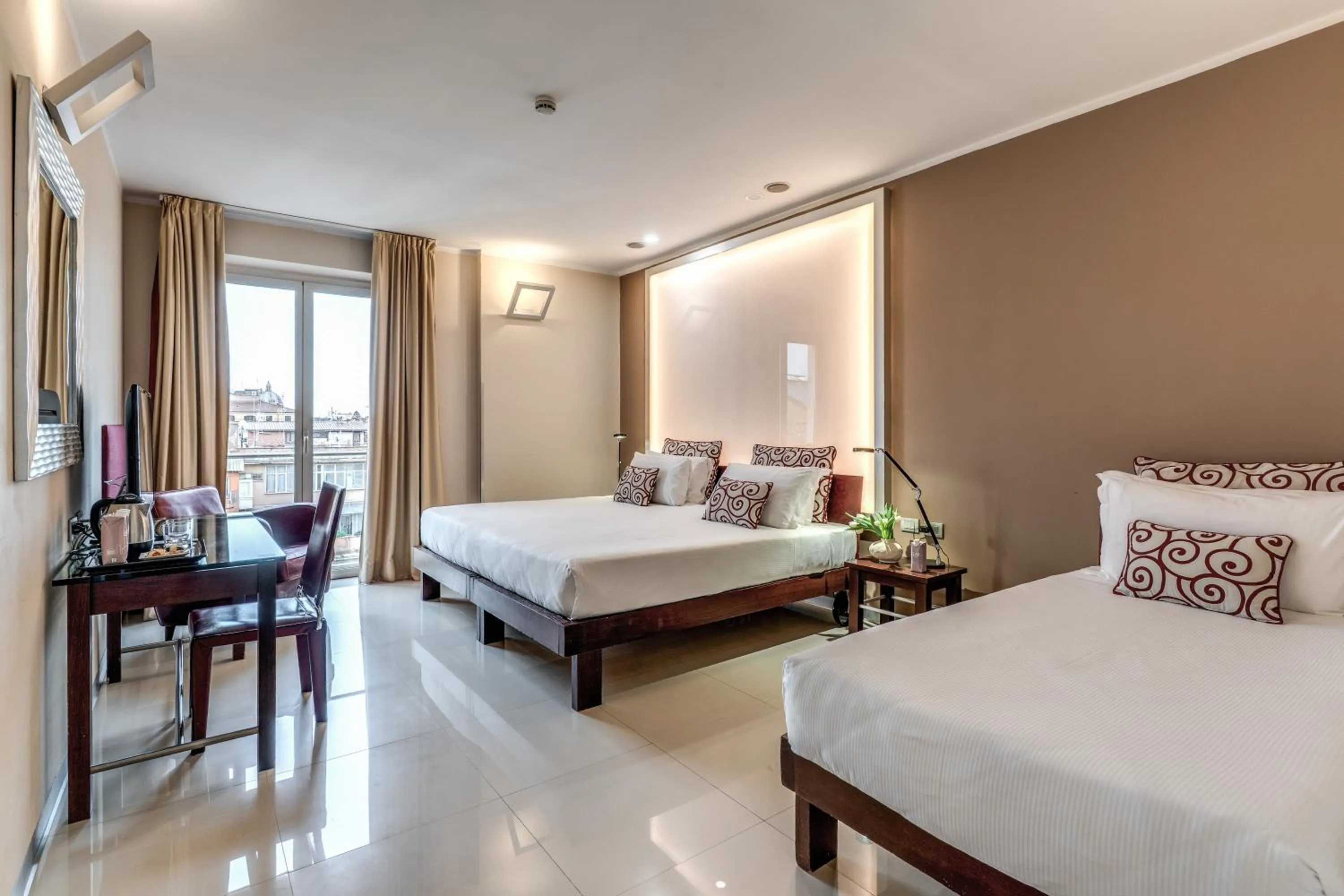 Bed in La Griffe Hotel Roma