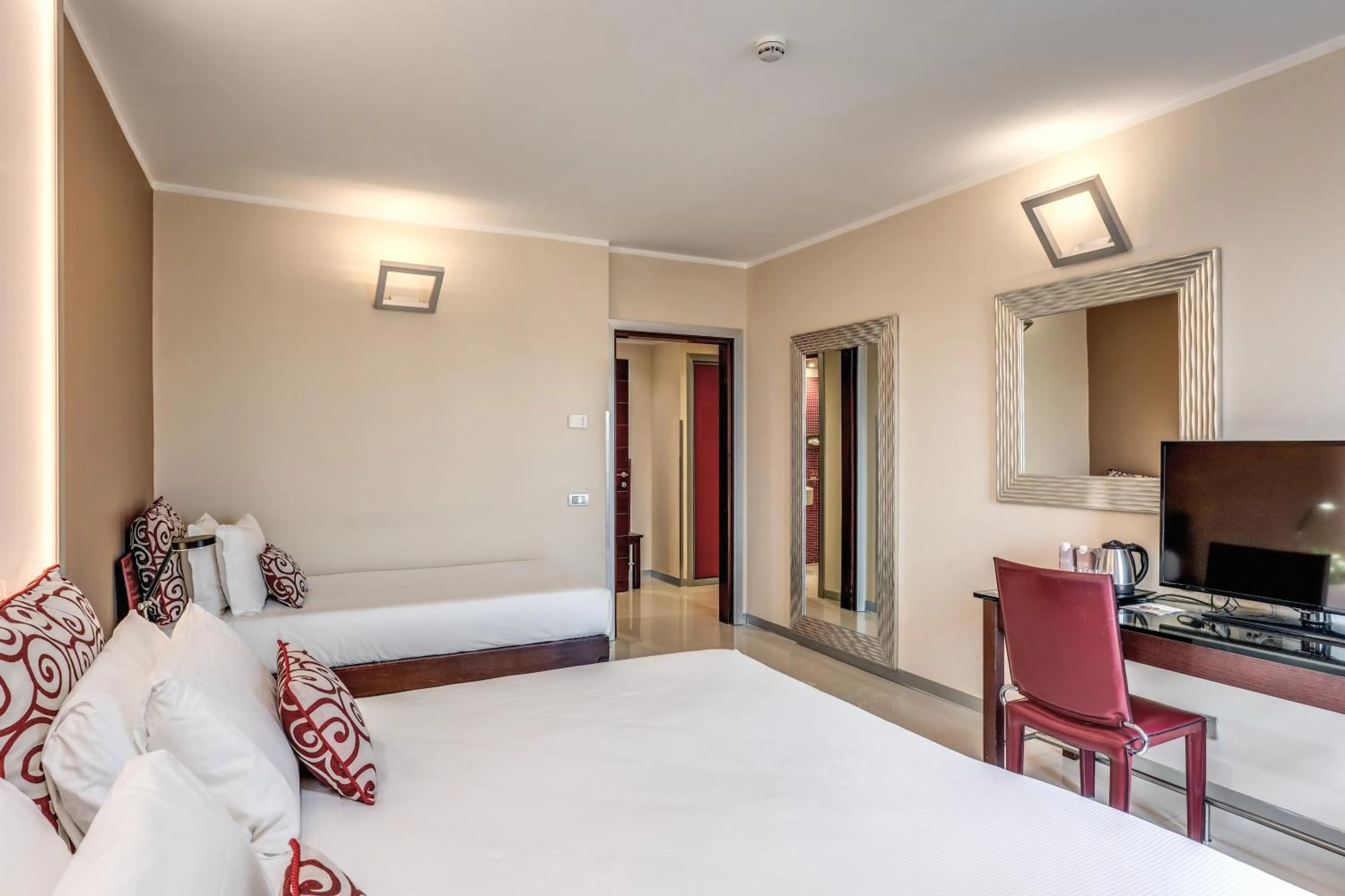 Bed in La Griffe Hotel Roma