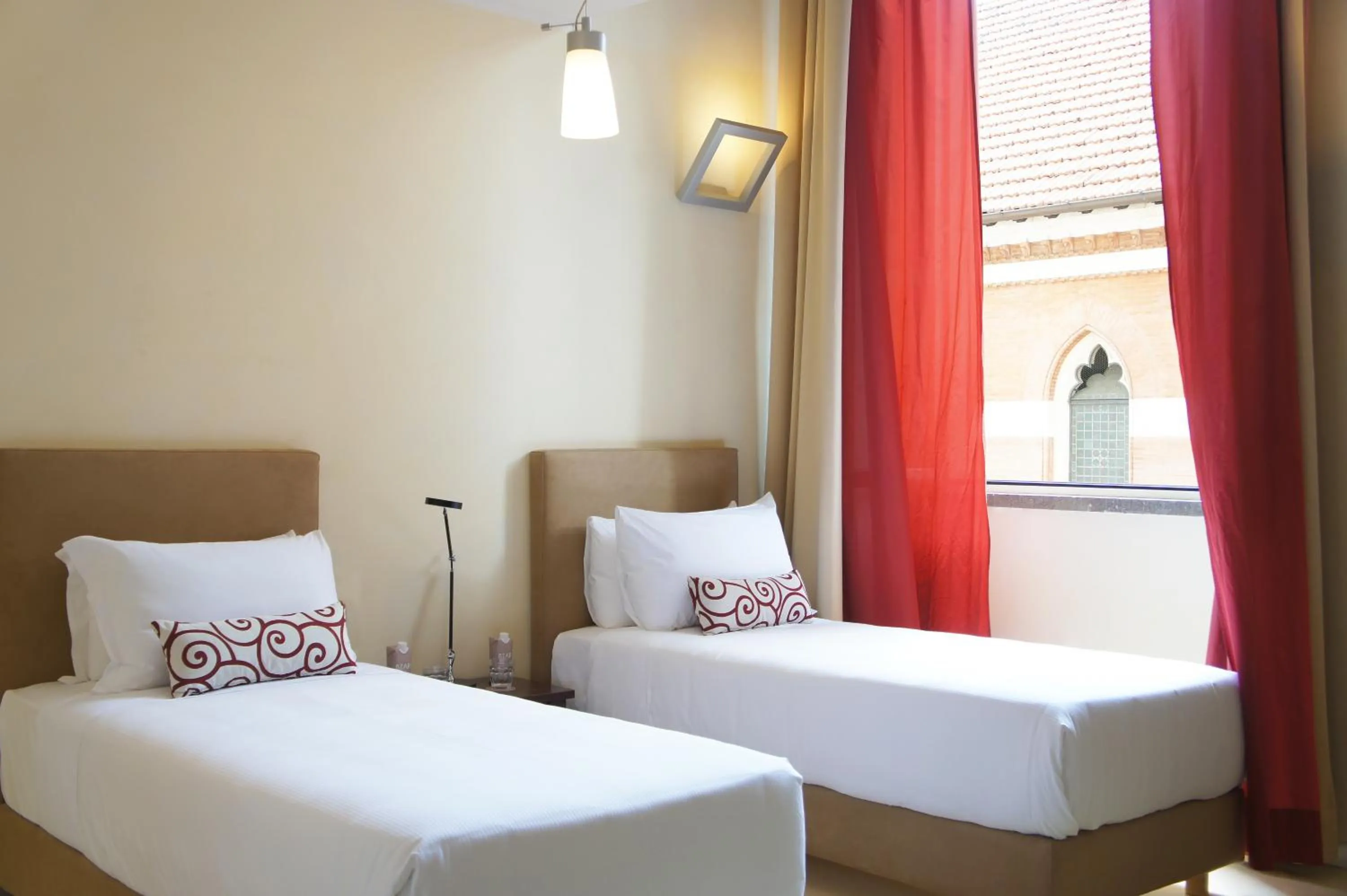 Bed in La Griffe Hotel Roma