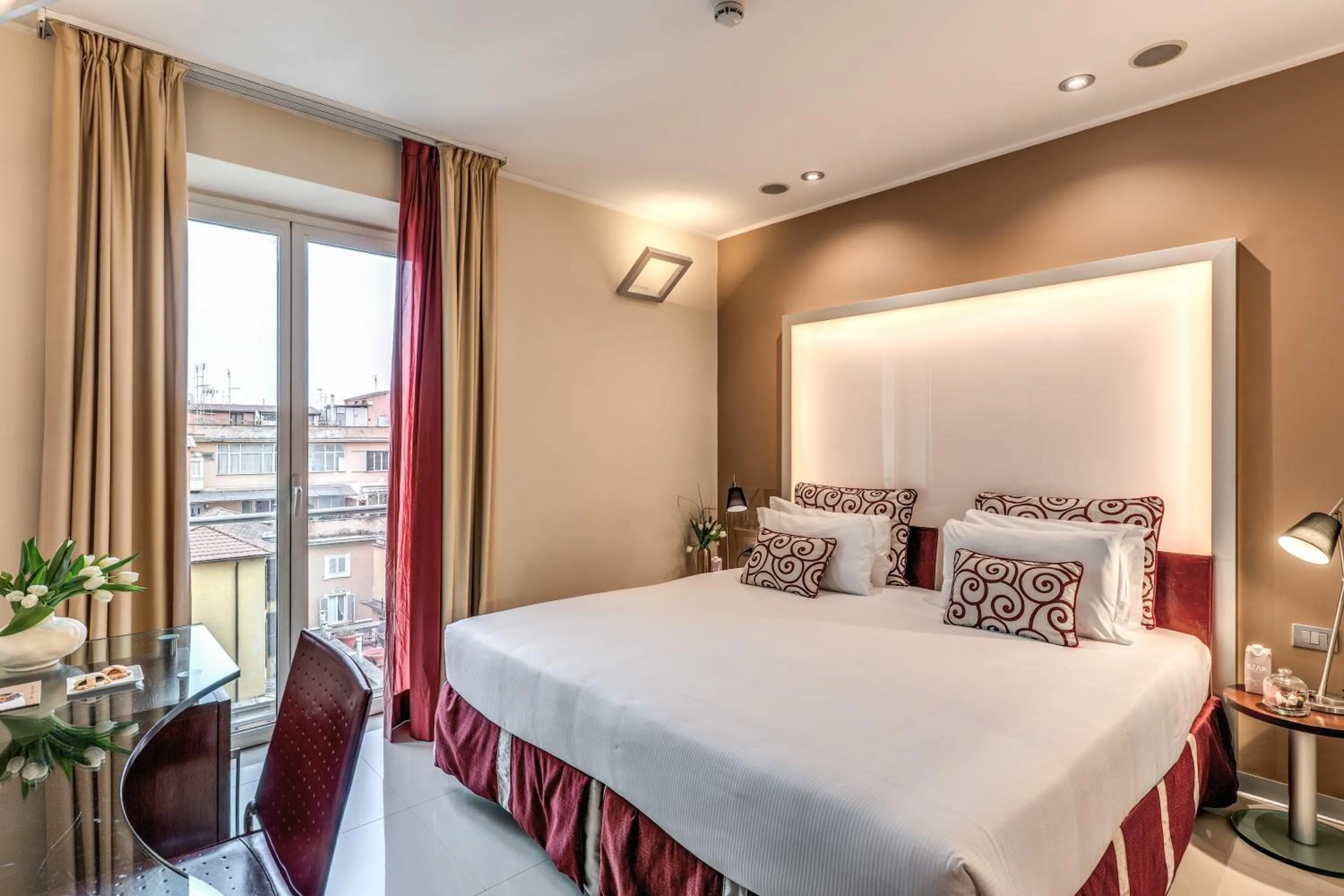 Bed in La Griffe Hotel Roma