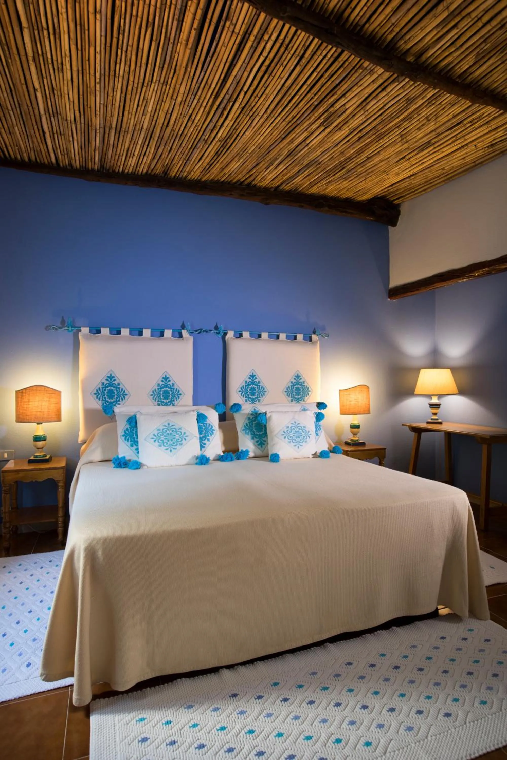 Bed in Su Gologone Experience Hotel