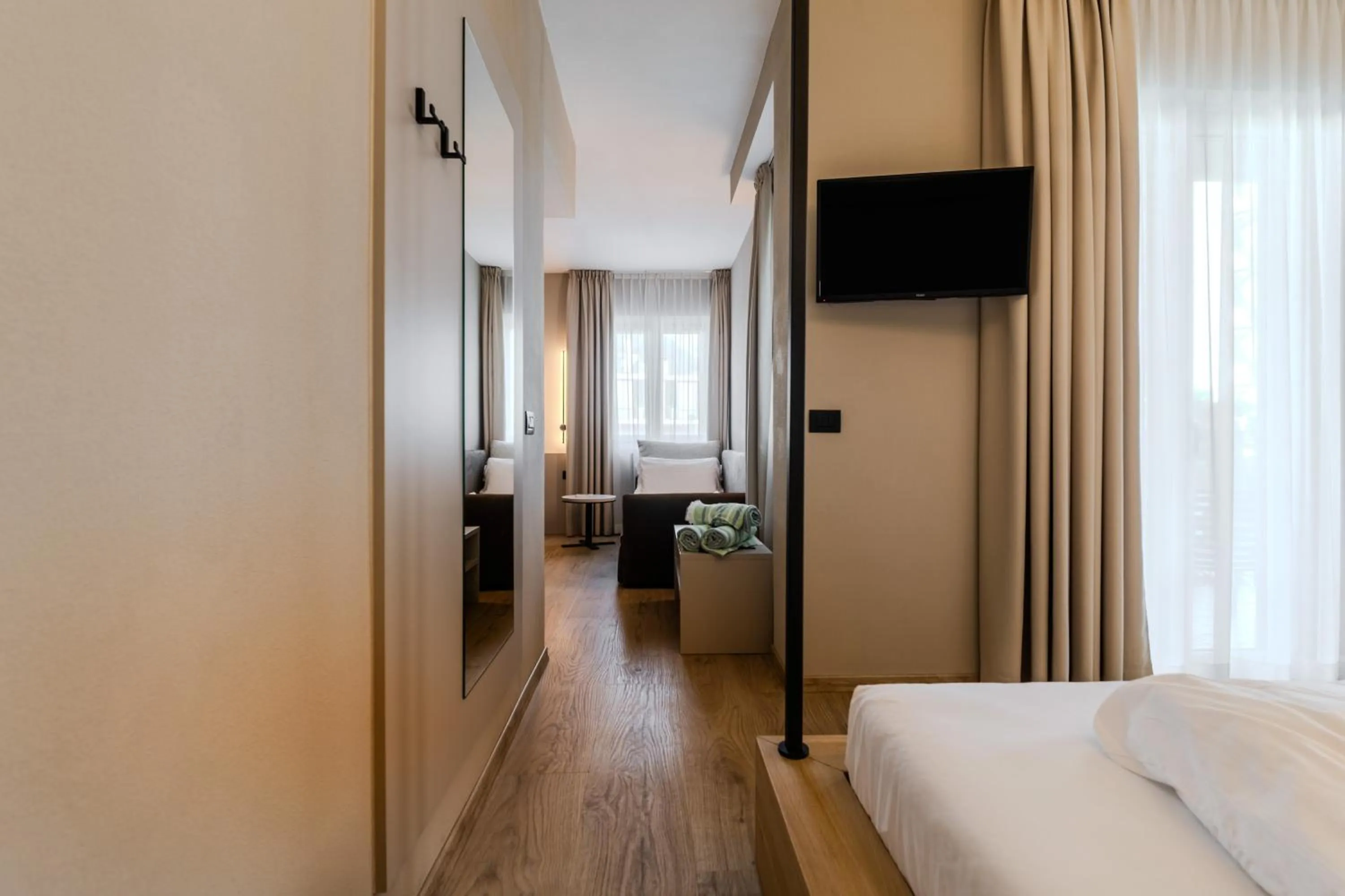 Living room, Bed in Brione Green Resort