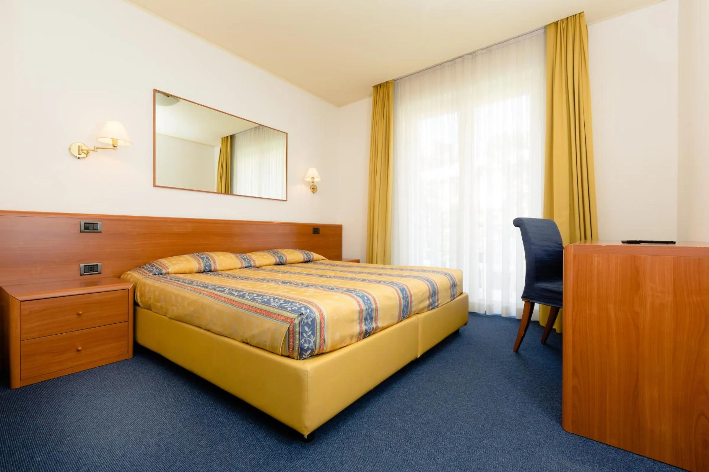 Photo of the whole room, Bed in Brione Green Resort