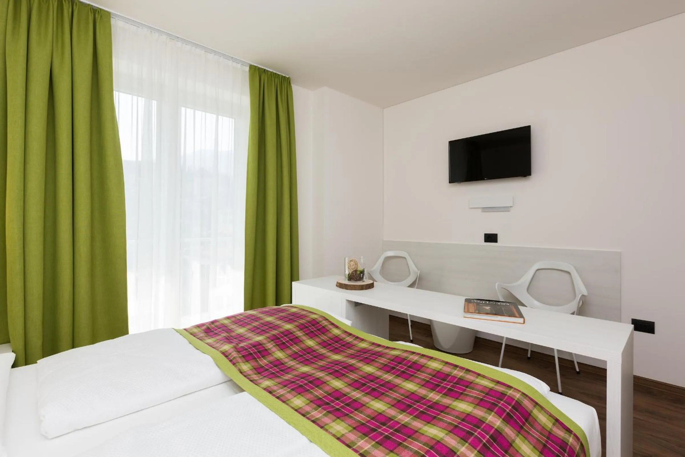 Bed in Brione Green Resort