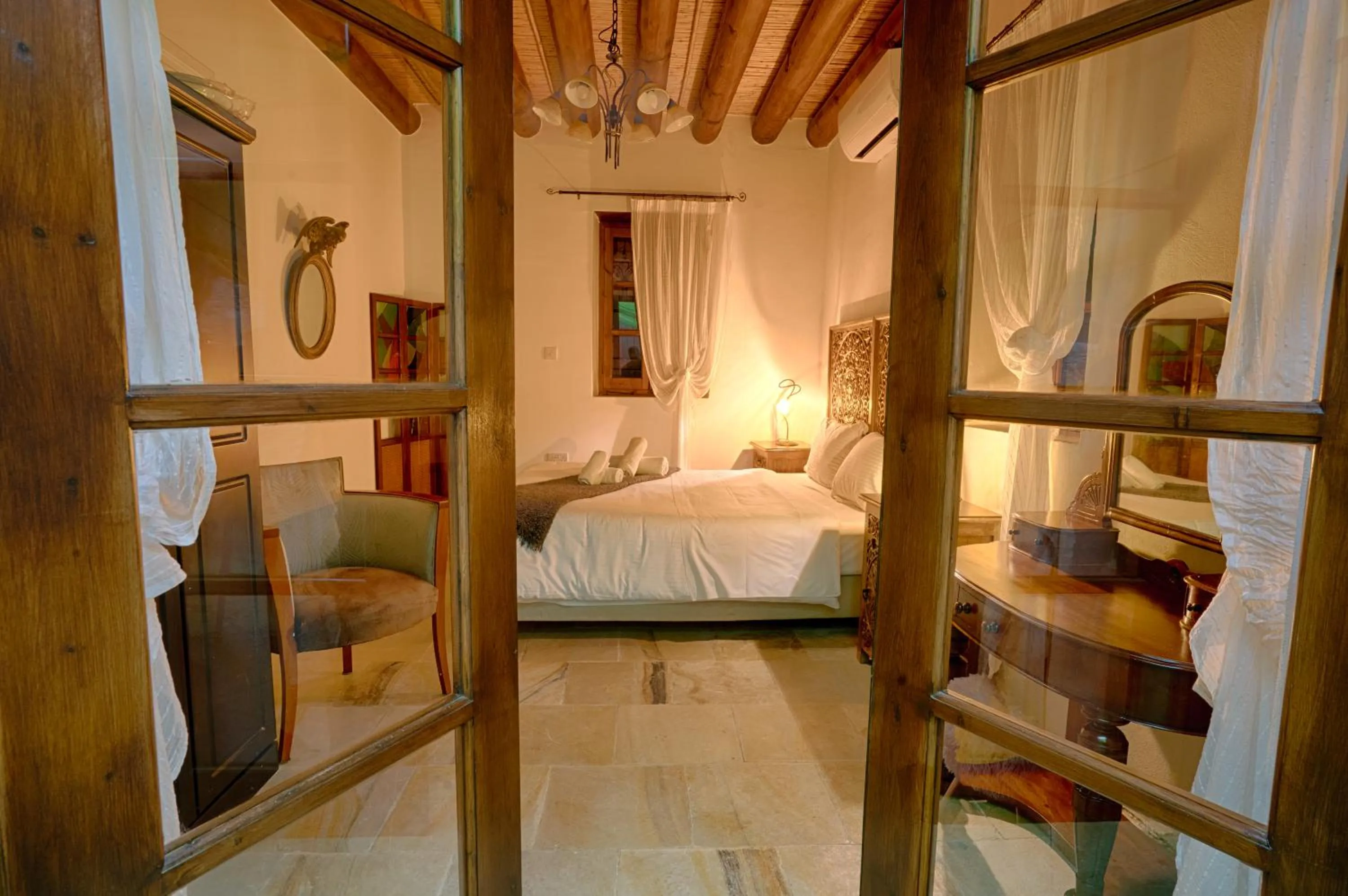 Bed in Oinoessa Traditional Boutique Guest Houses