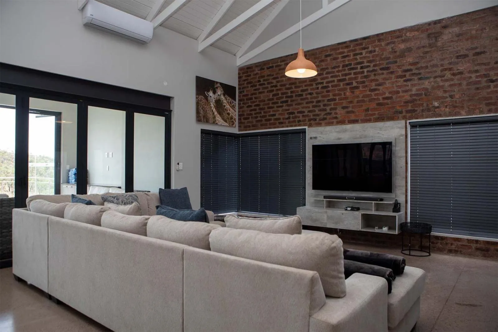 Communal lounge/ TV room in Elements Sunrise Bush Lodge