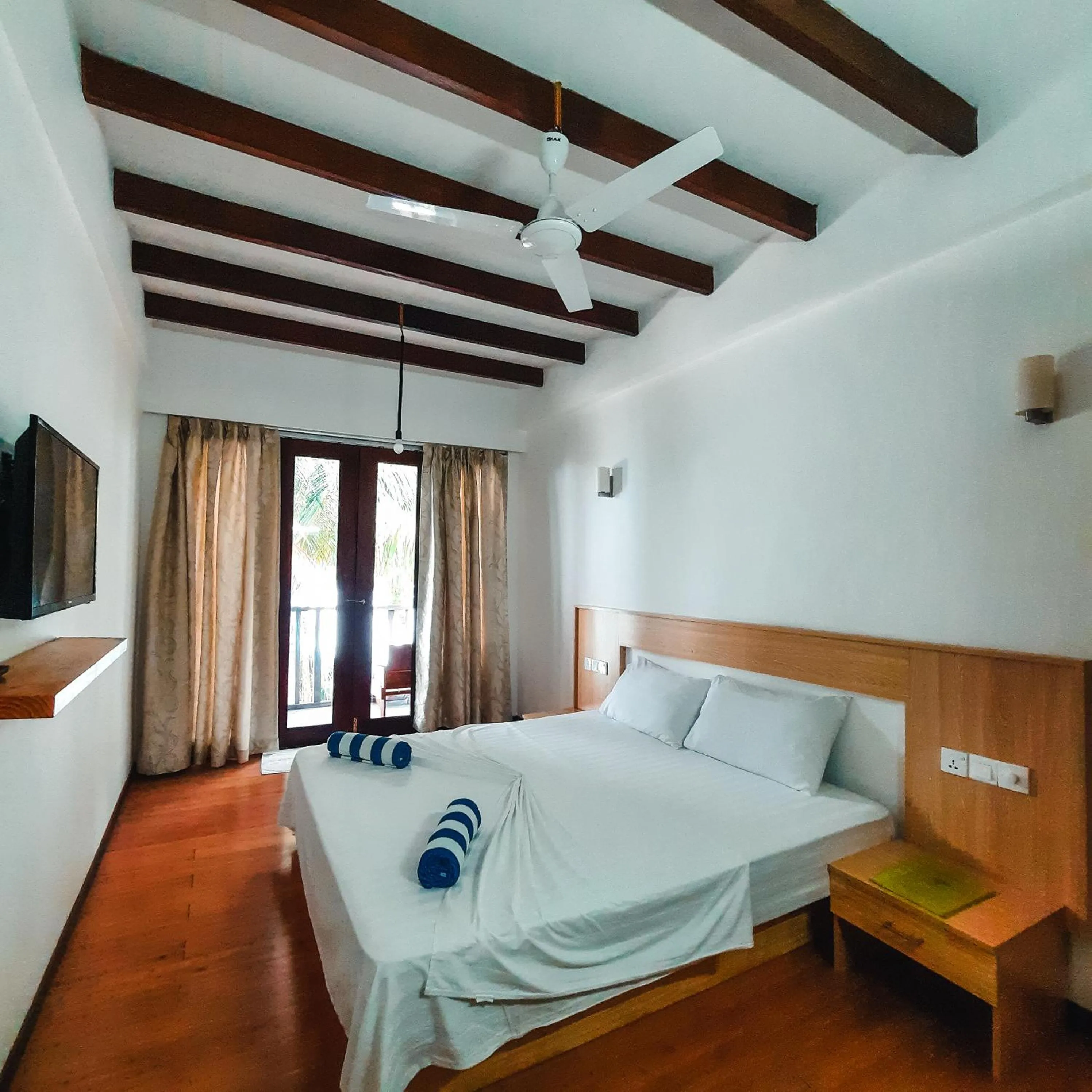 Photo of the whole room, Bed in Thundi Sea View