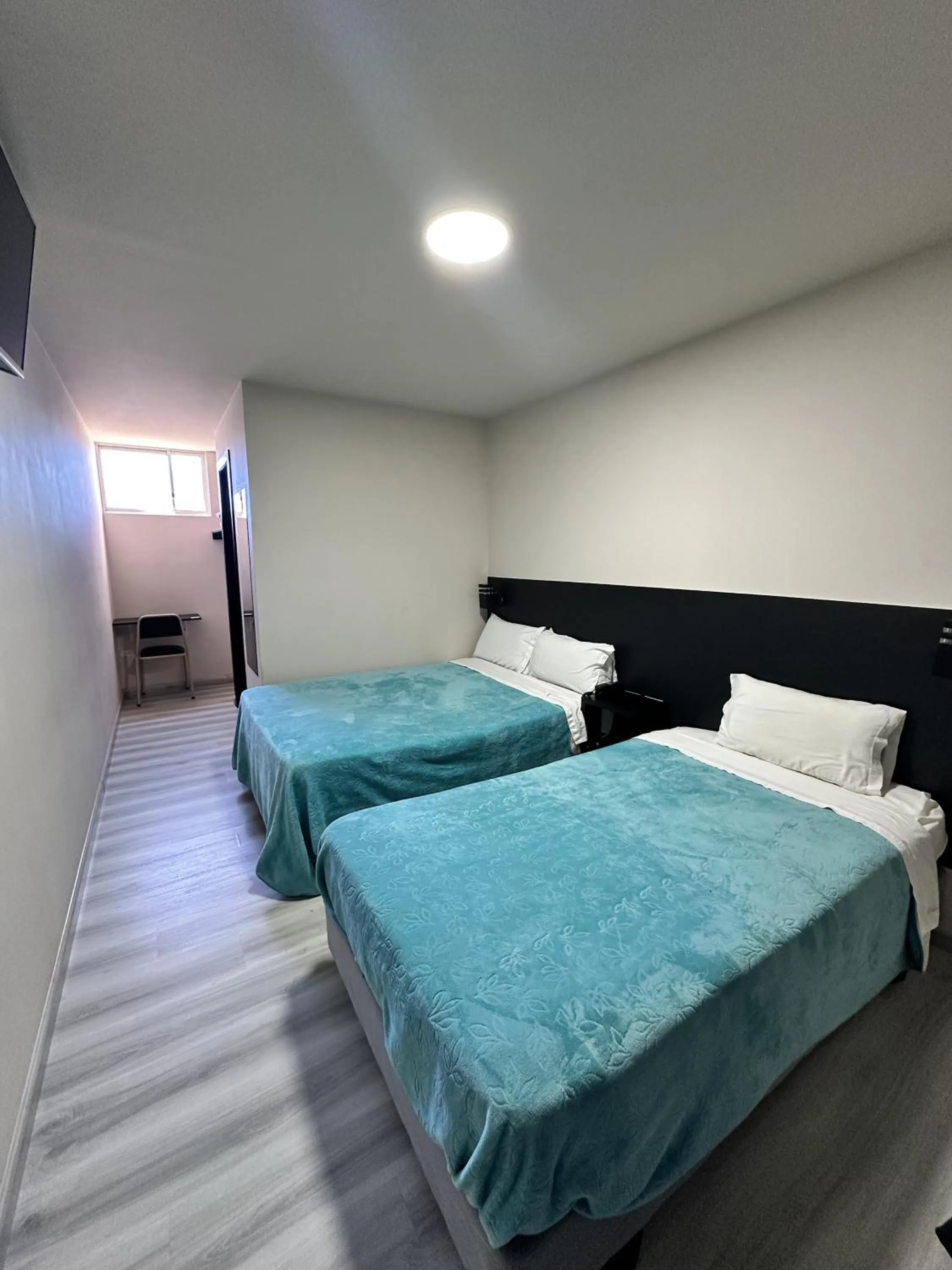 Bed in Hotel Versailles