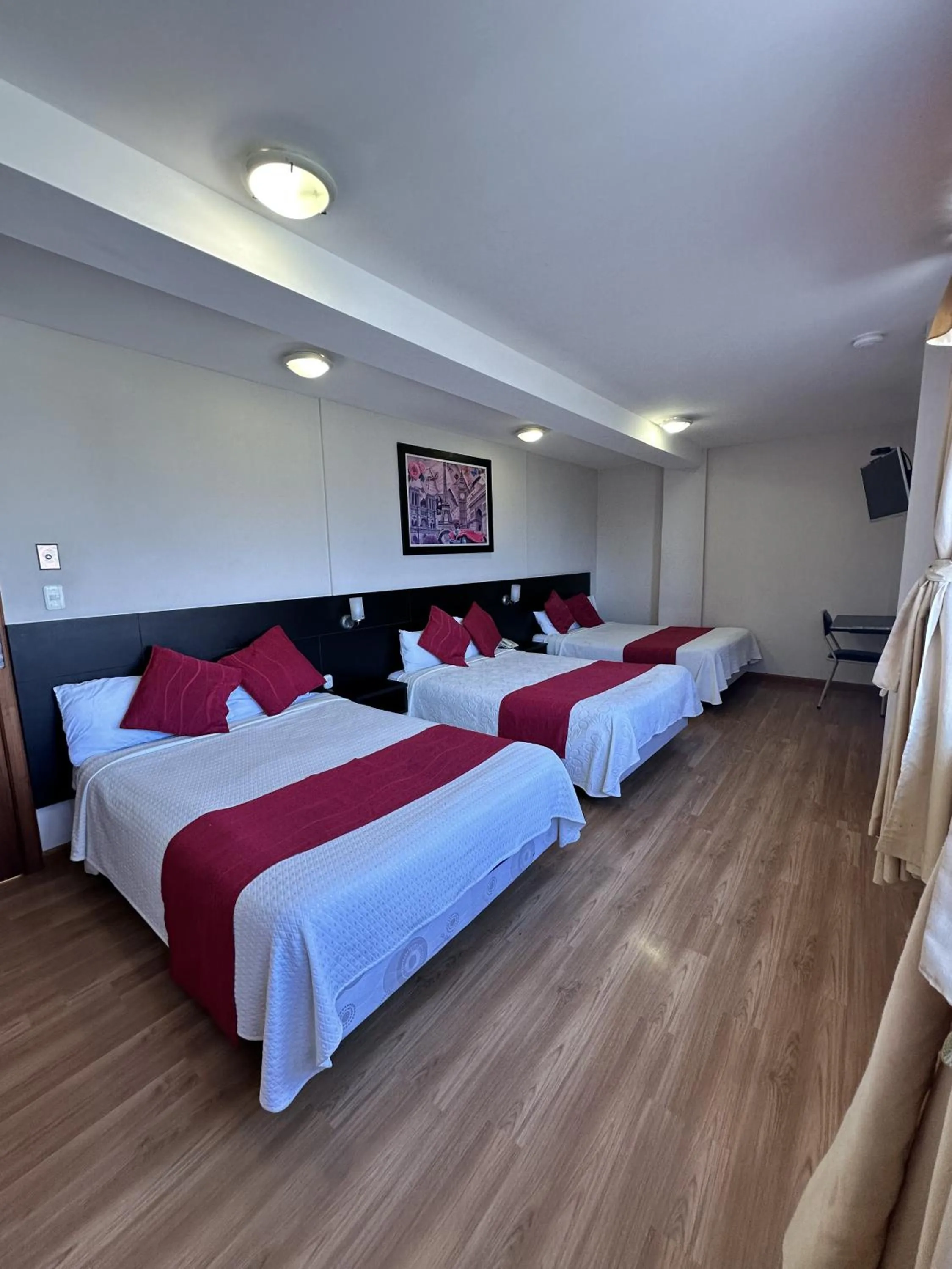 Bed in Hotel Versailles