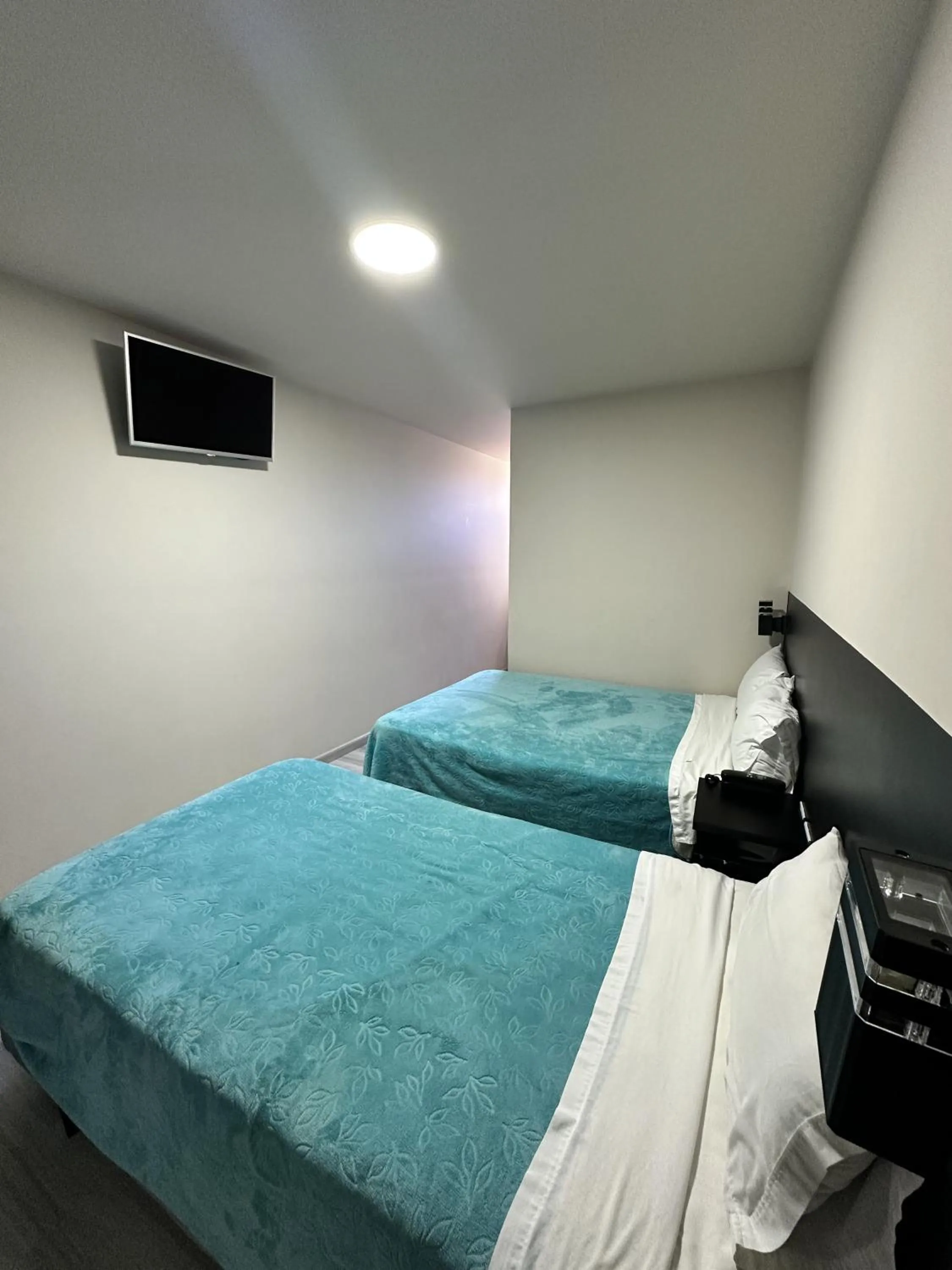 Bed in Hotel Versailles