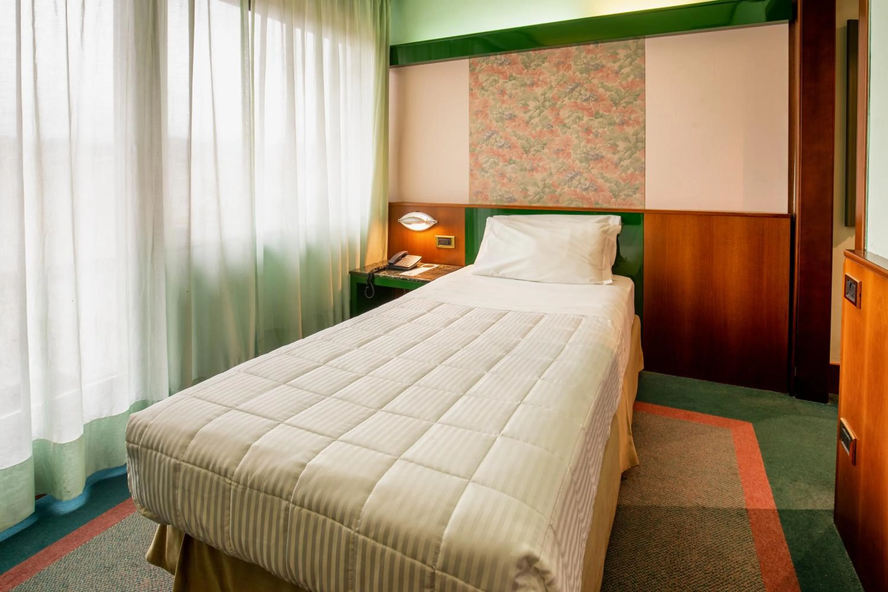 Bed in Hotel Royal Palace