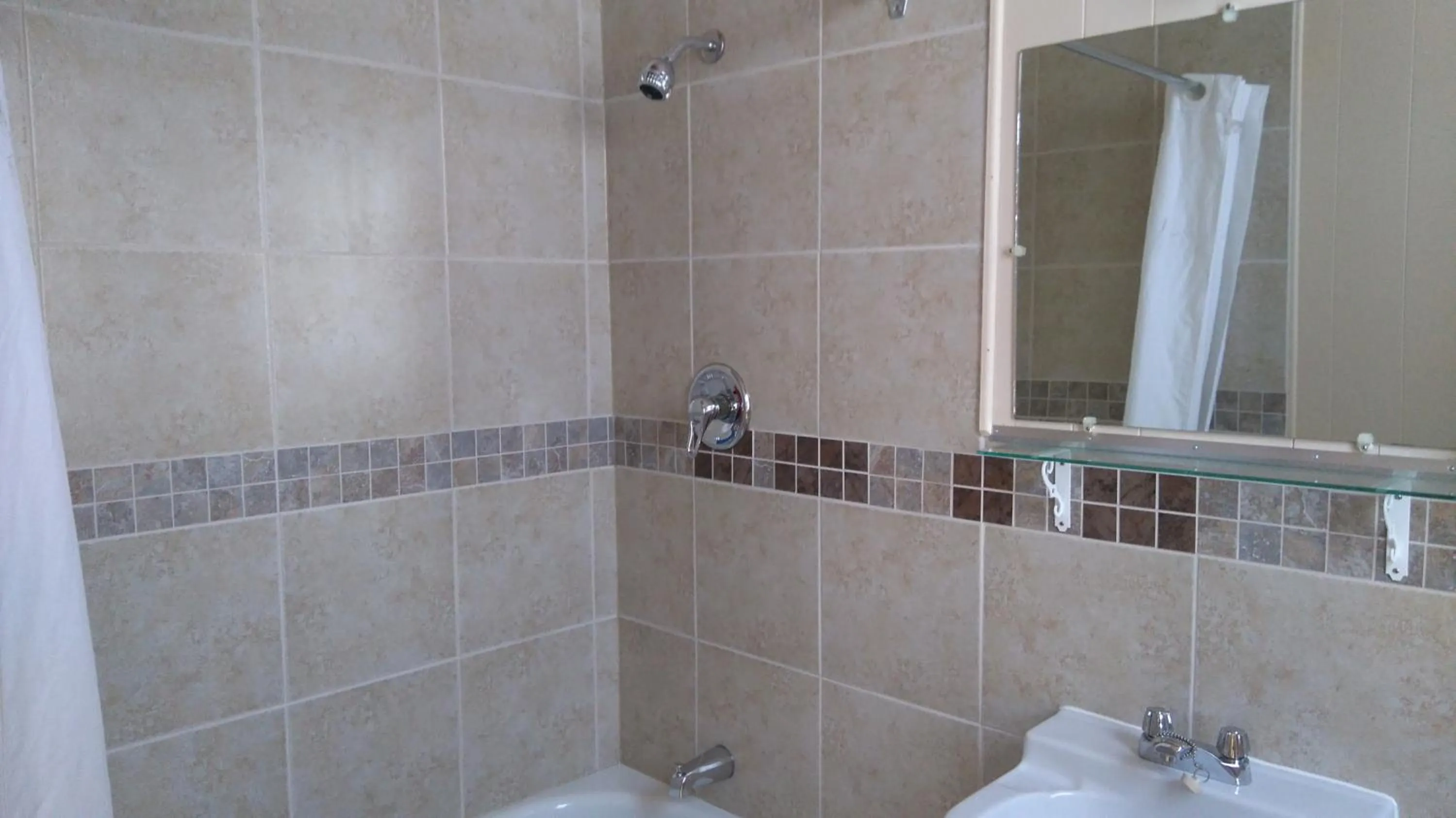 Shower in Oasis Motel