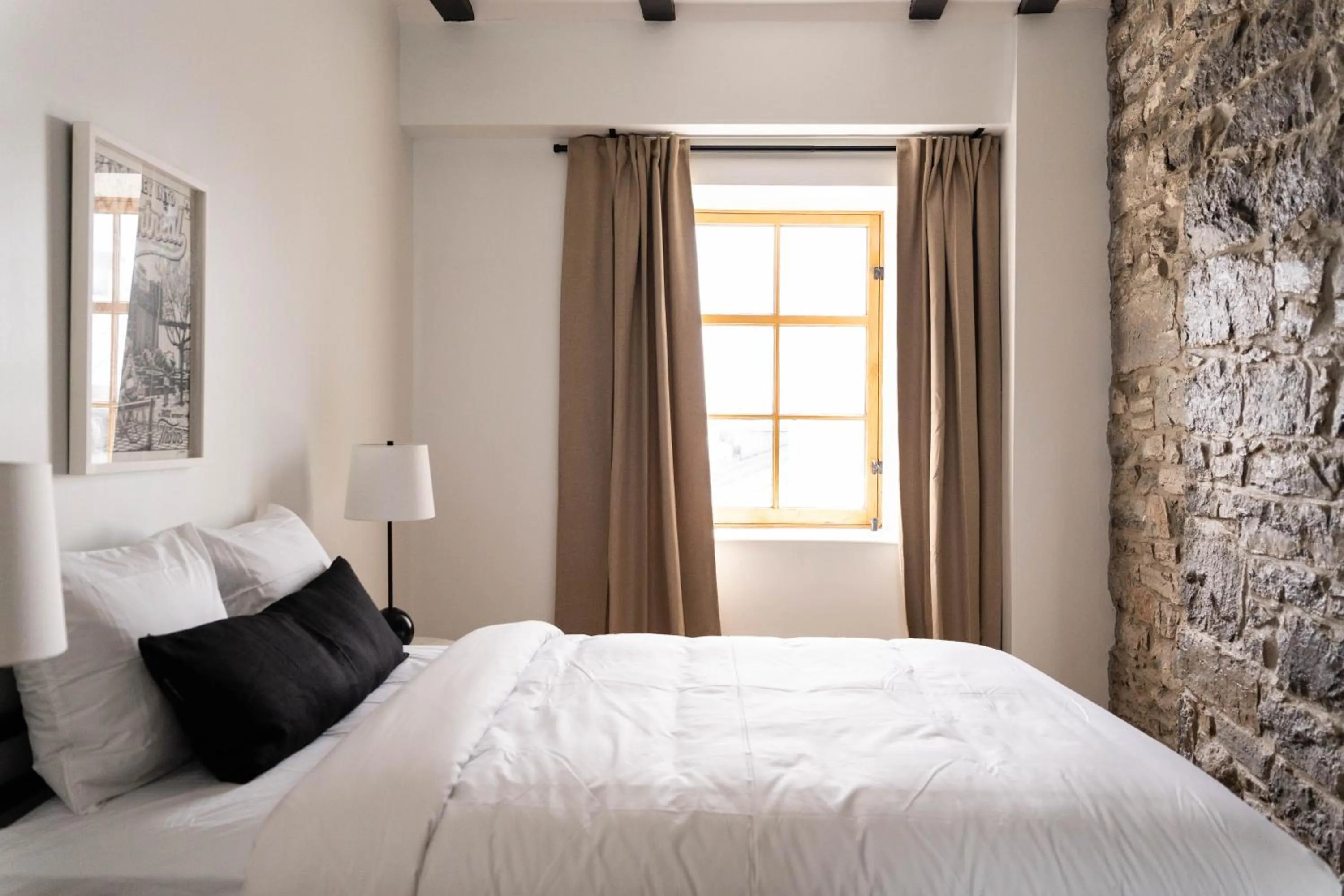 Bed in Maison Rasco by Luxury In Transit