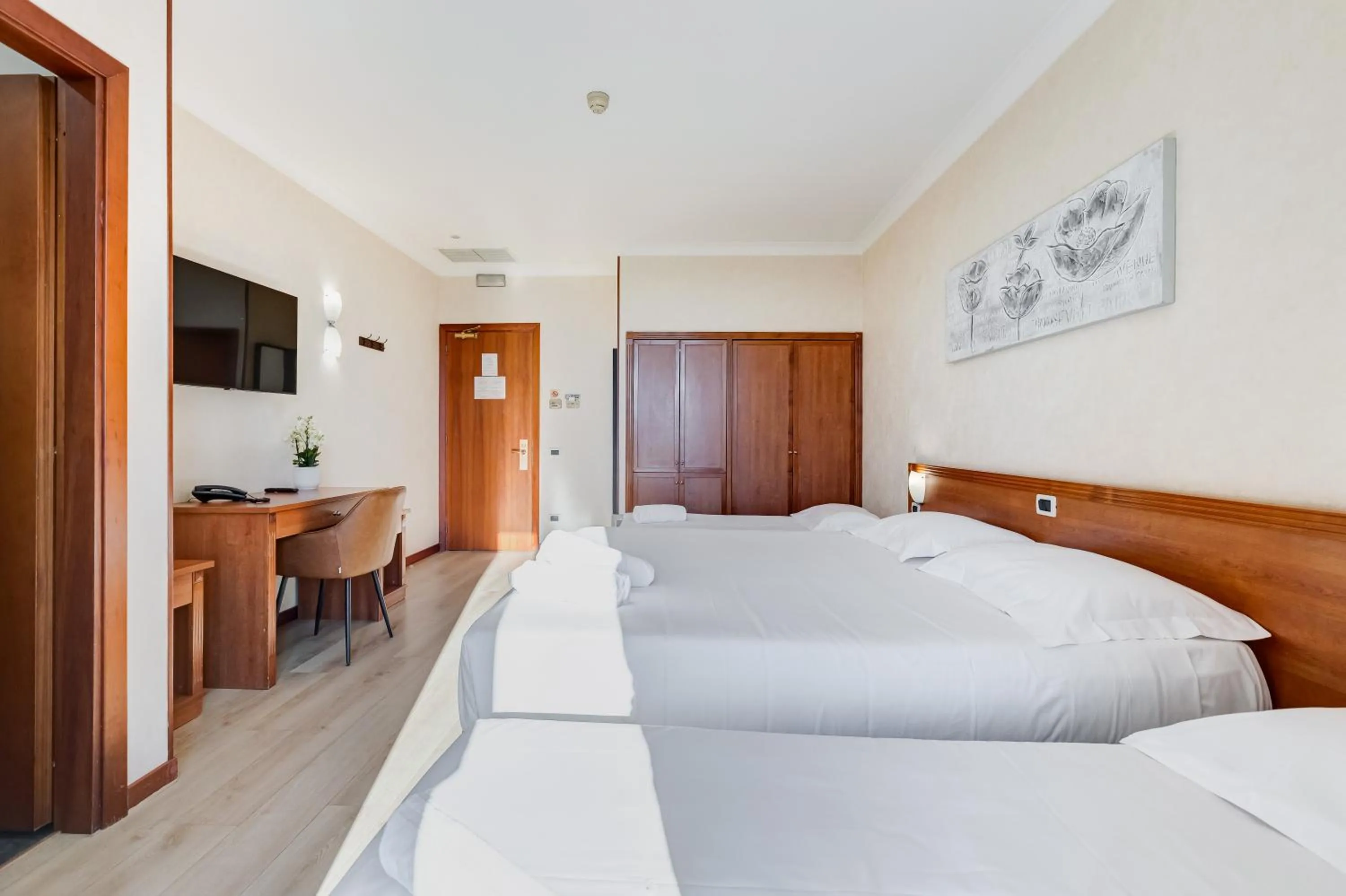 Bed in Romoli Hotel