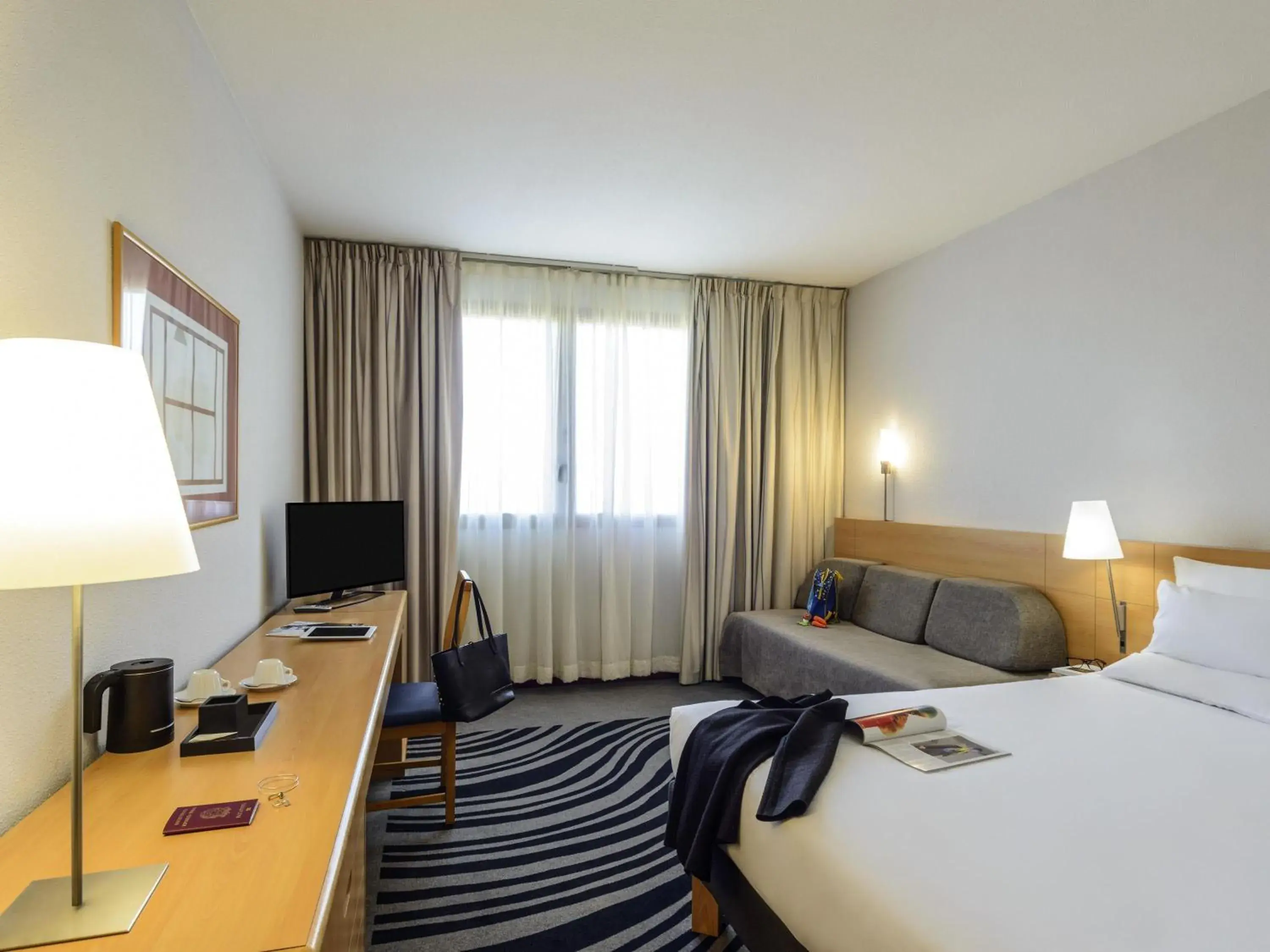 Standard King Room with Sofa Bed in Novotel Torino Corso Giulio Cesare Standard King Room with Sofa Bed in Novotel Torino Corso Giulio Cesare