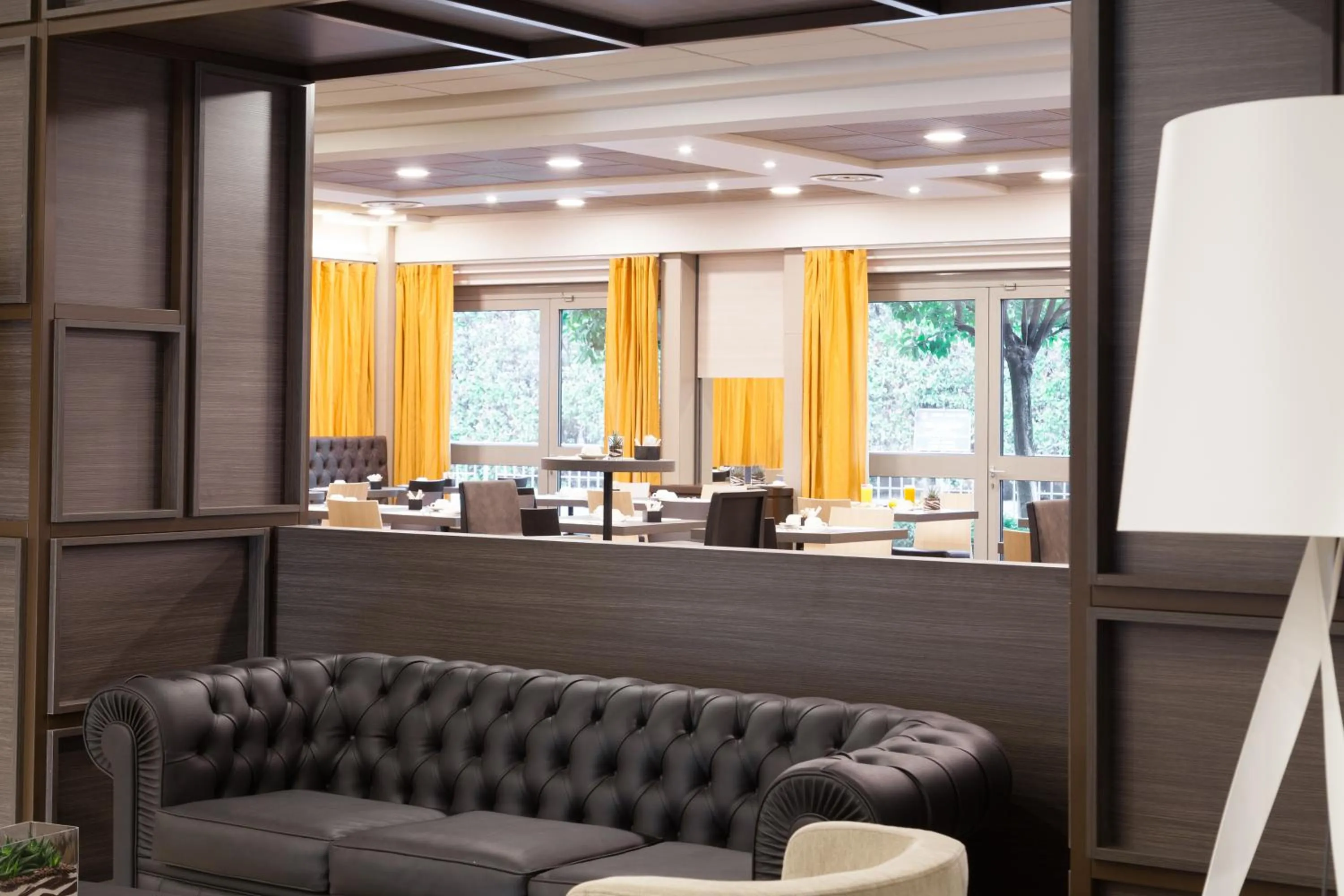 Lobby or reception in Novotel Brescia Due