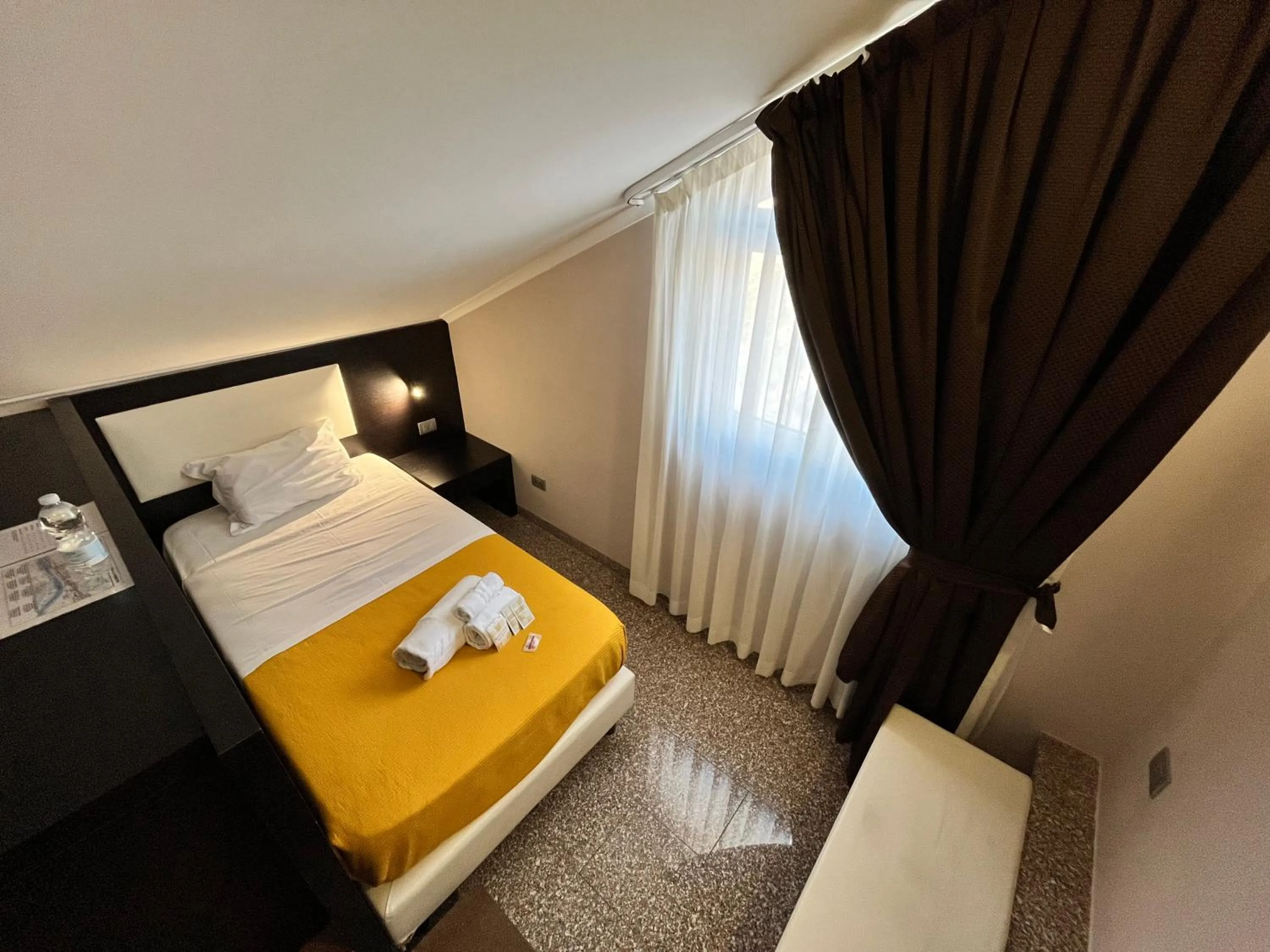 Bed in EH Suites Rome Airport Euro House Hotels
