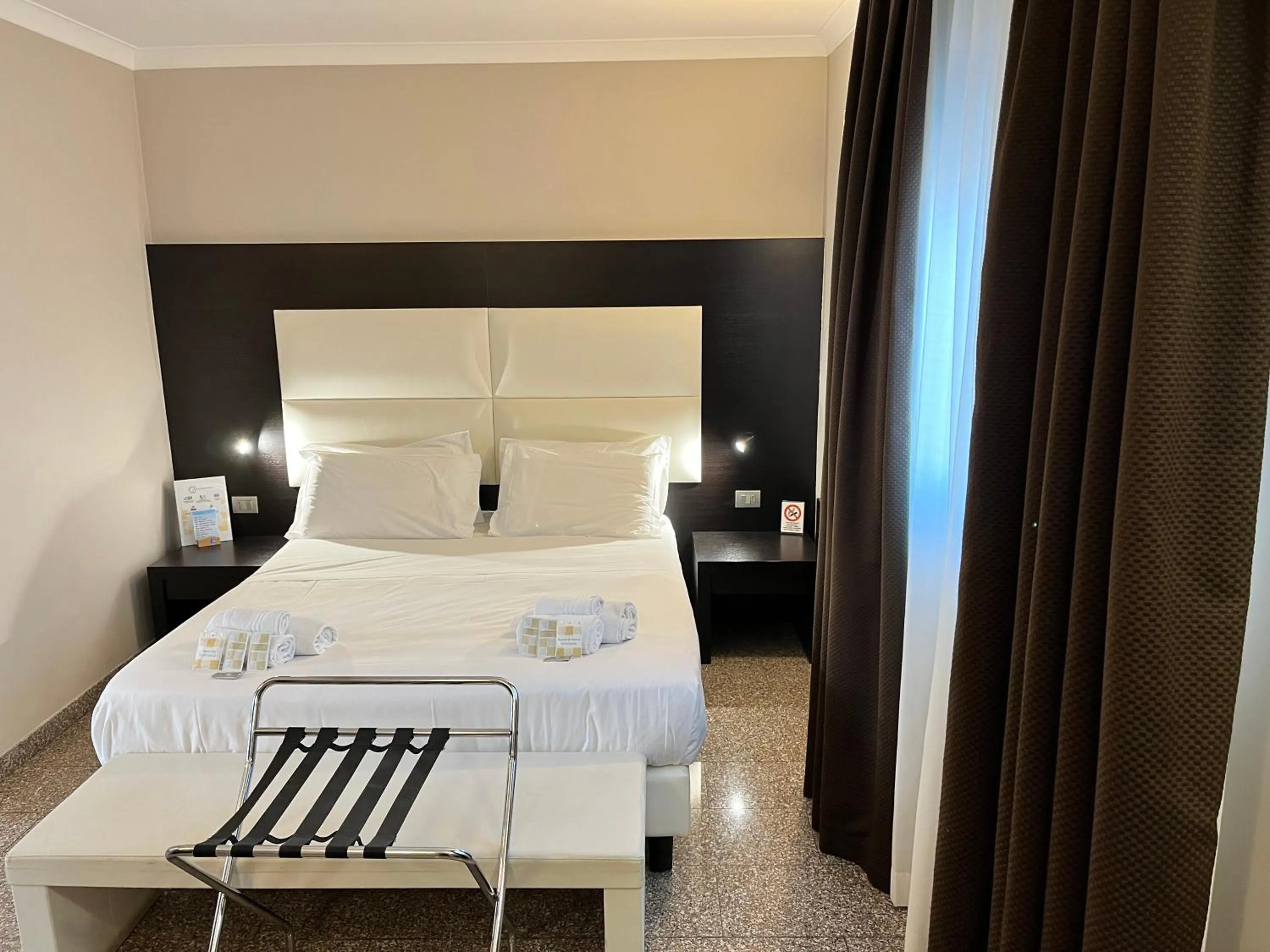 Bed in EH Suites Rome Airport Euro House Hotels