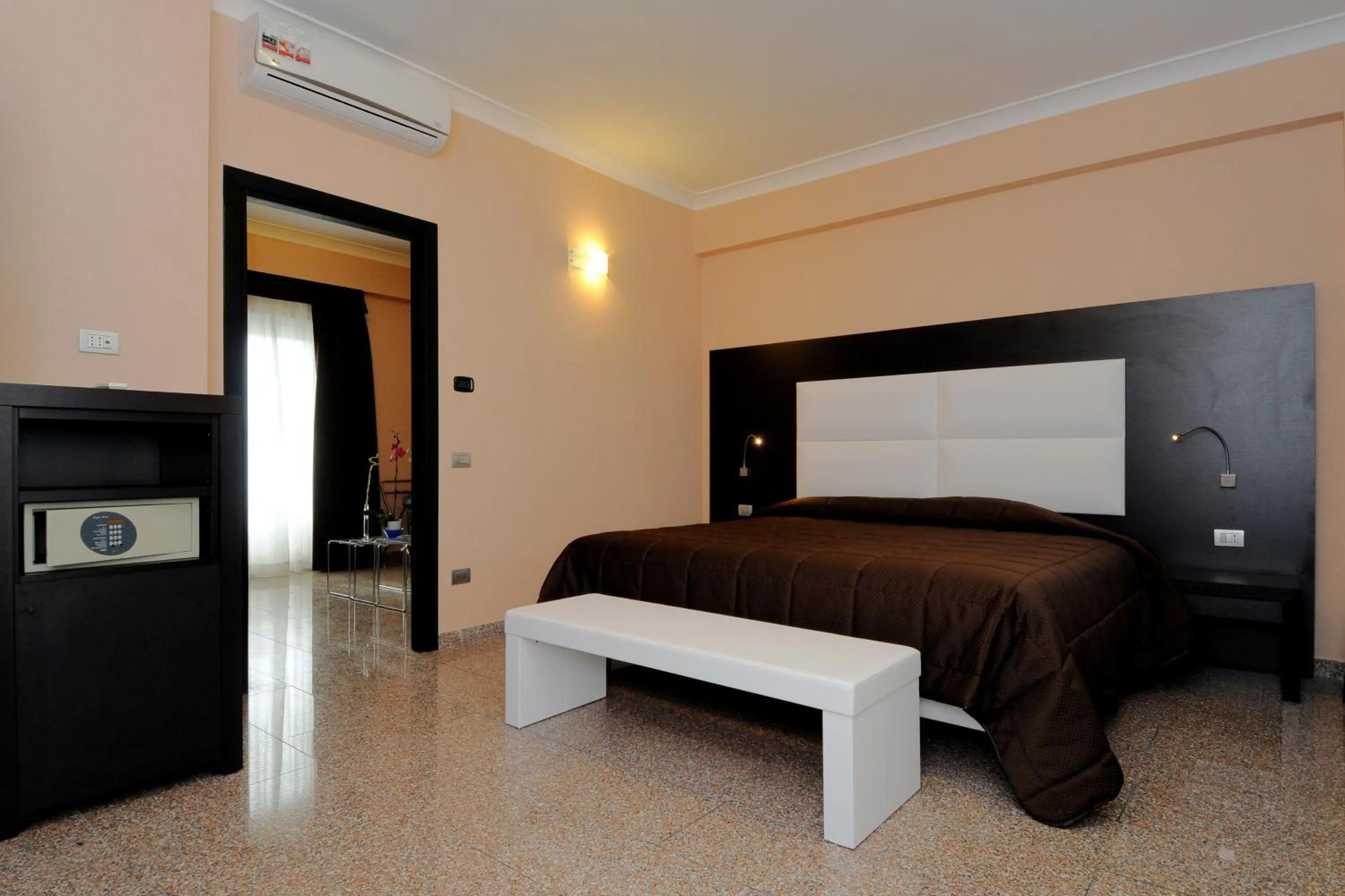Bed in EH Suites Rome Airport Euro House Hotels