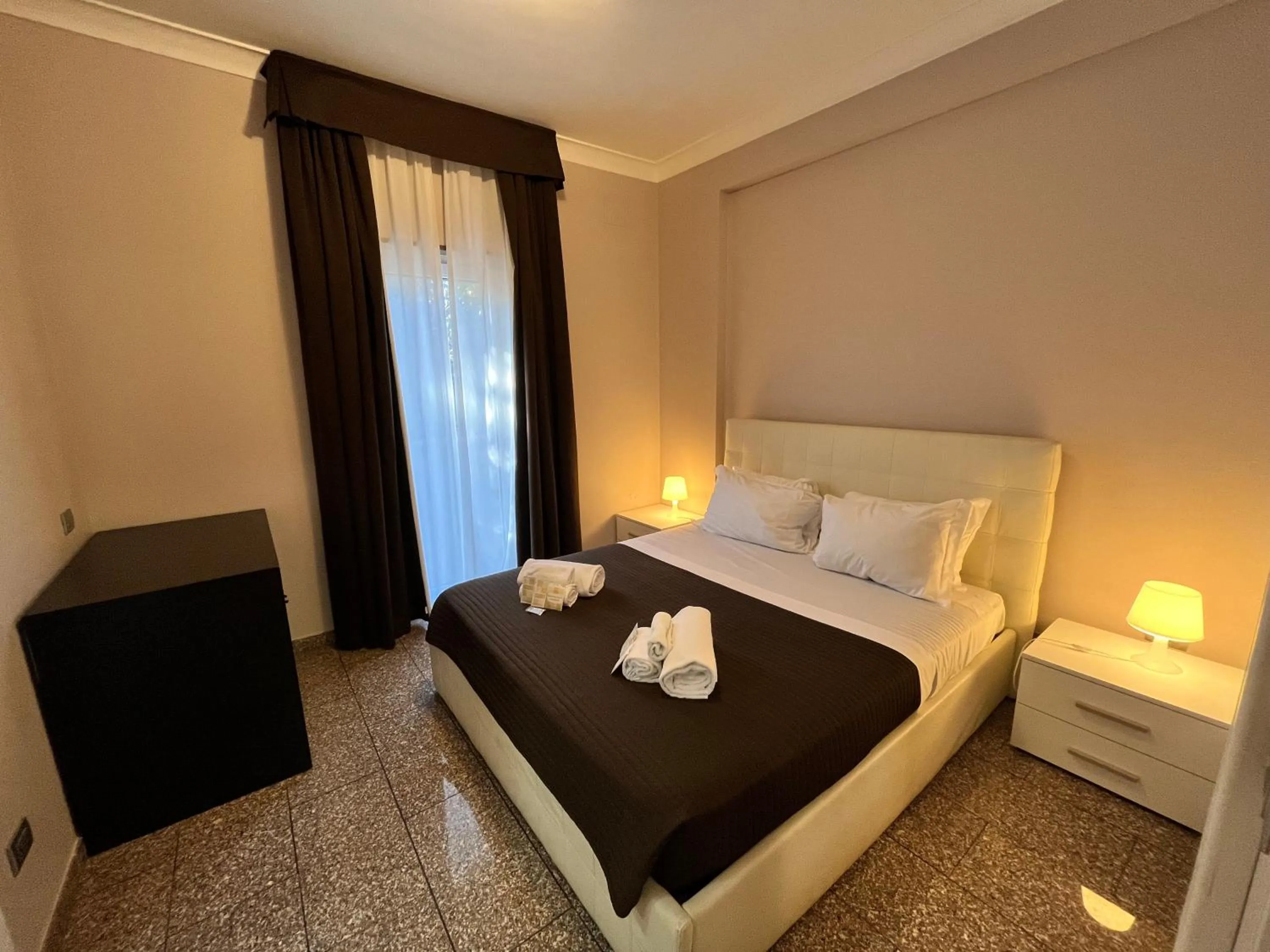 Bed in EH Suites Rome Airport Euro House Hotels