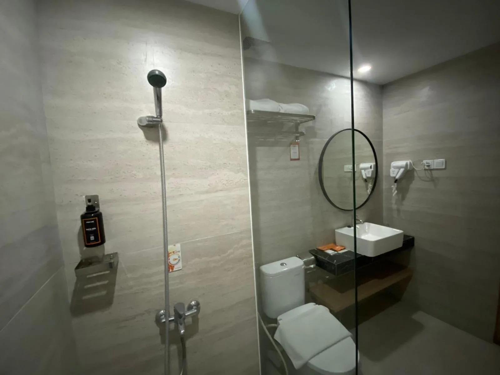 Bathroom in Front One King Hotel Tuban