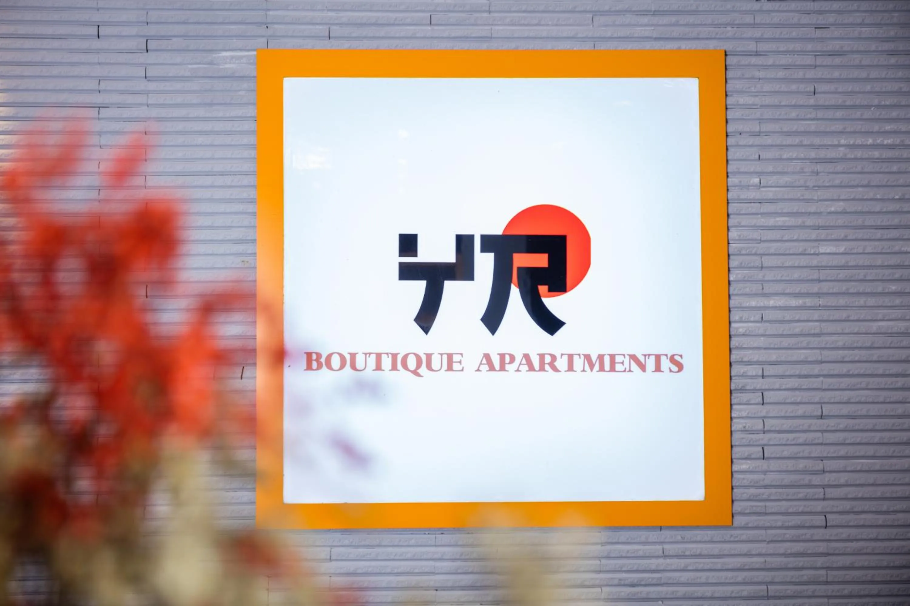 Logo/Certificate/Sign in YR Hotel & Apartments