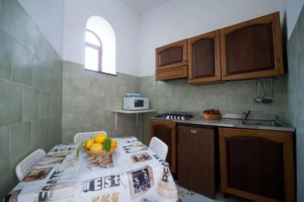 Kitchen or kitchenette in Villaggio Residence Nettuno