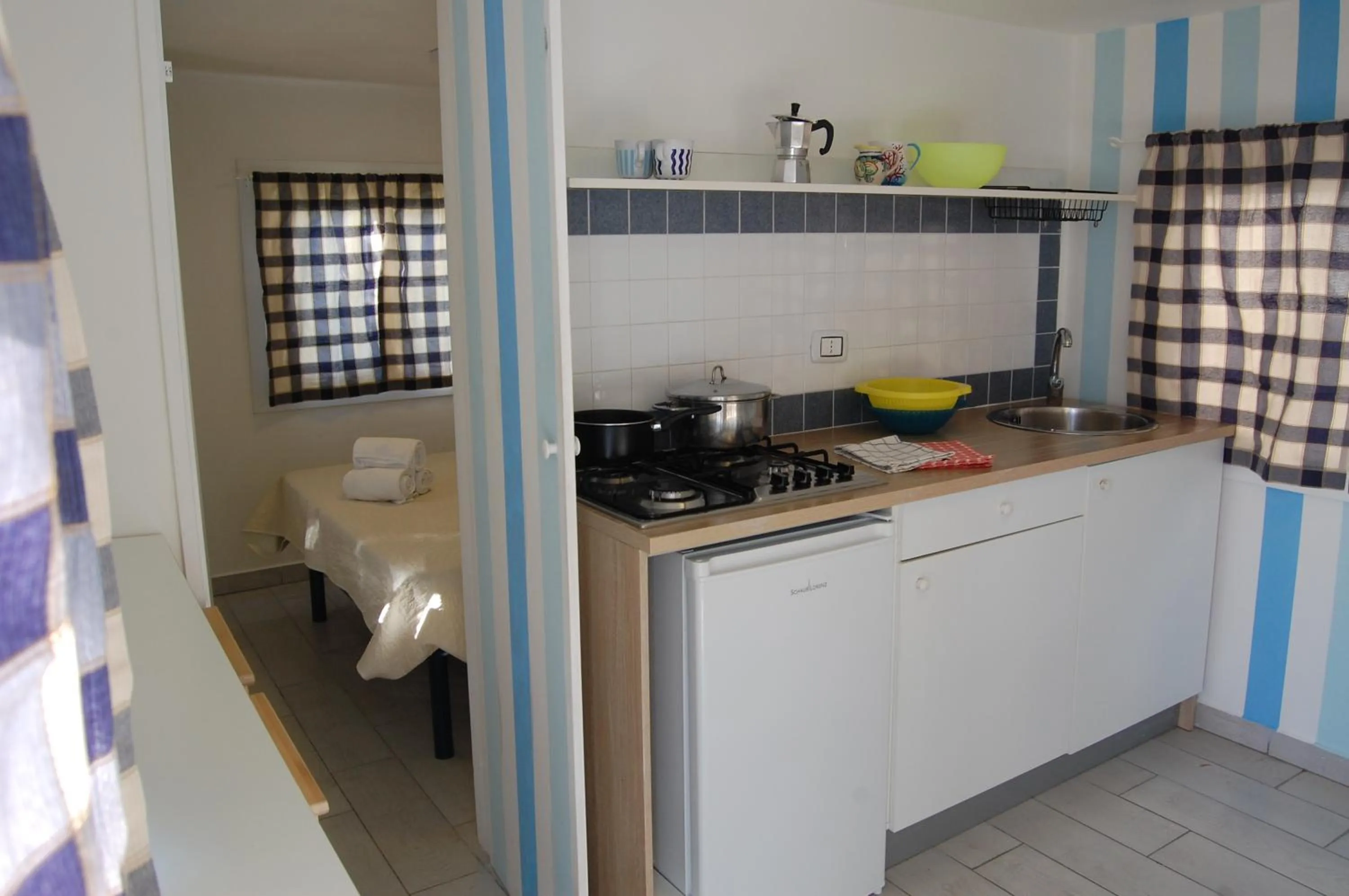 Kitchen or kitchenette in Villaggio Residence Nettuno