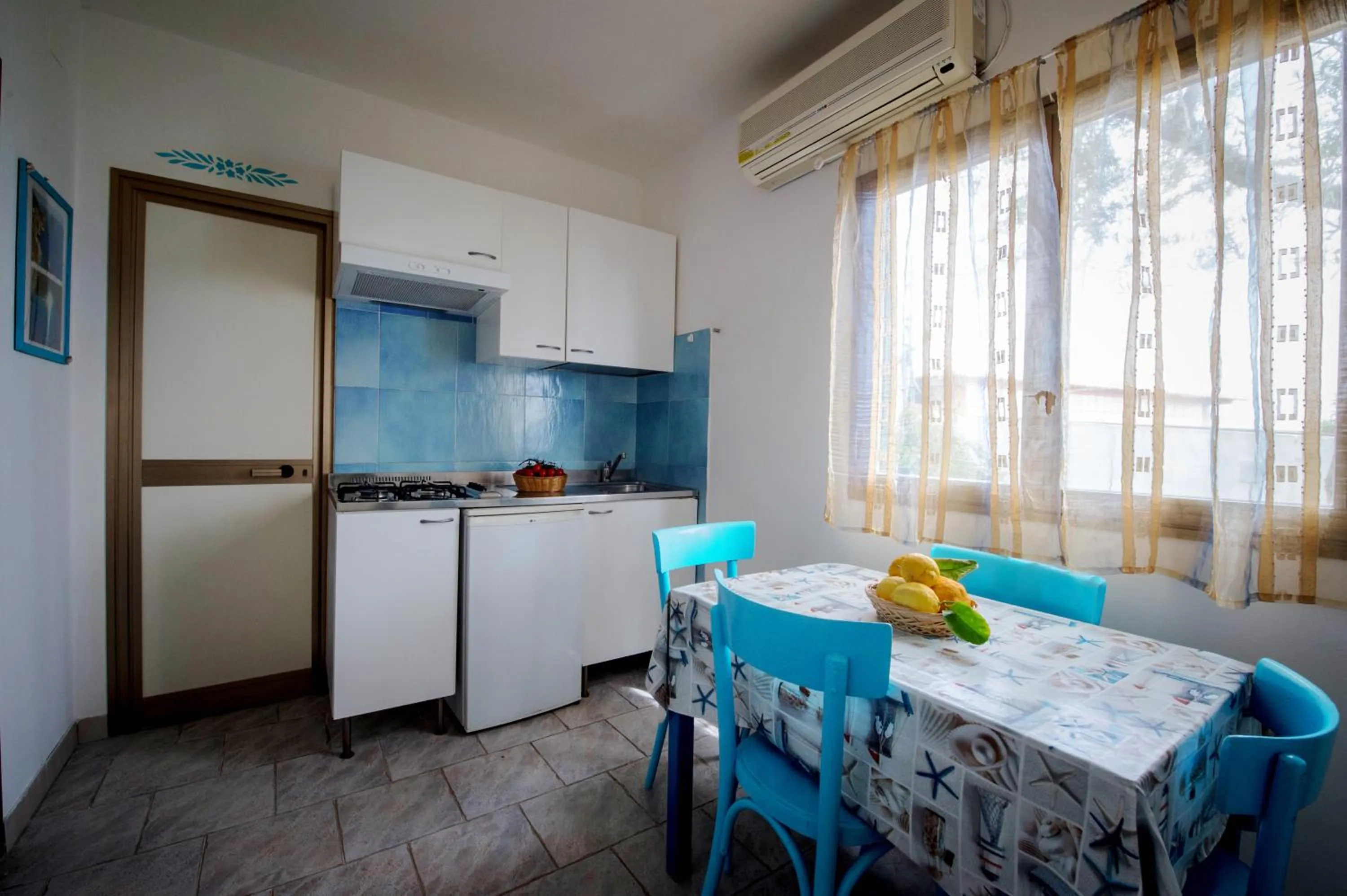 Dining area in Villaggio Residence Nettuno