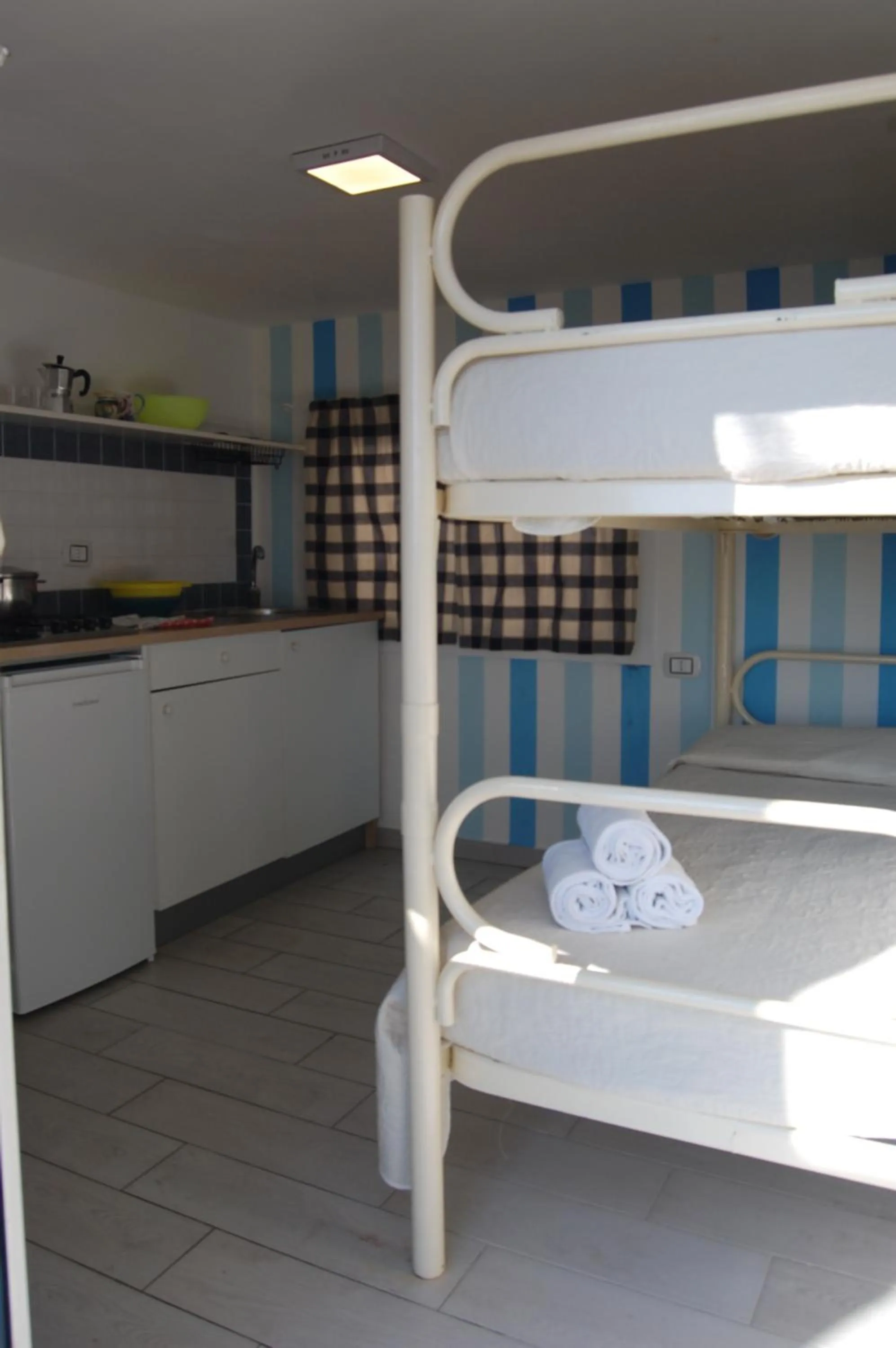 kitchen, Bed in Villaggio Residence Nettuno