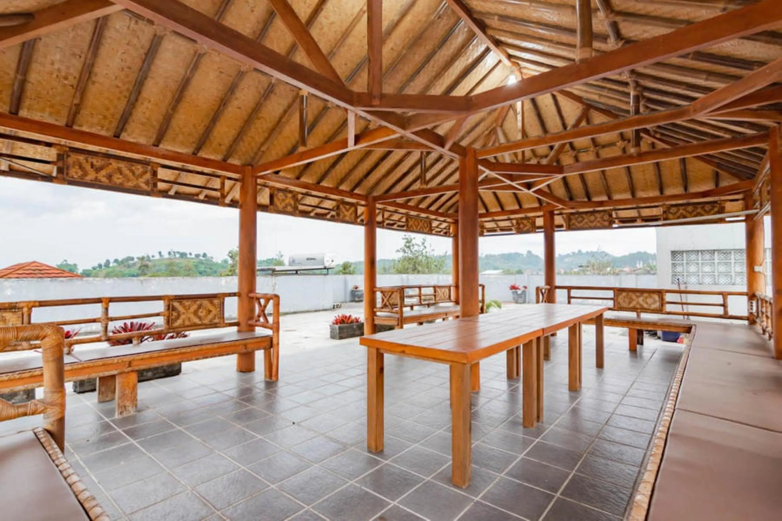 Balcony/Terrace in RedDoorz near Lembang Park & Zoo 2