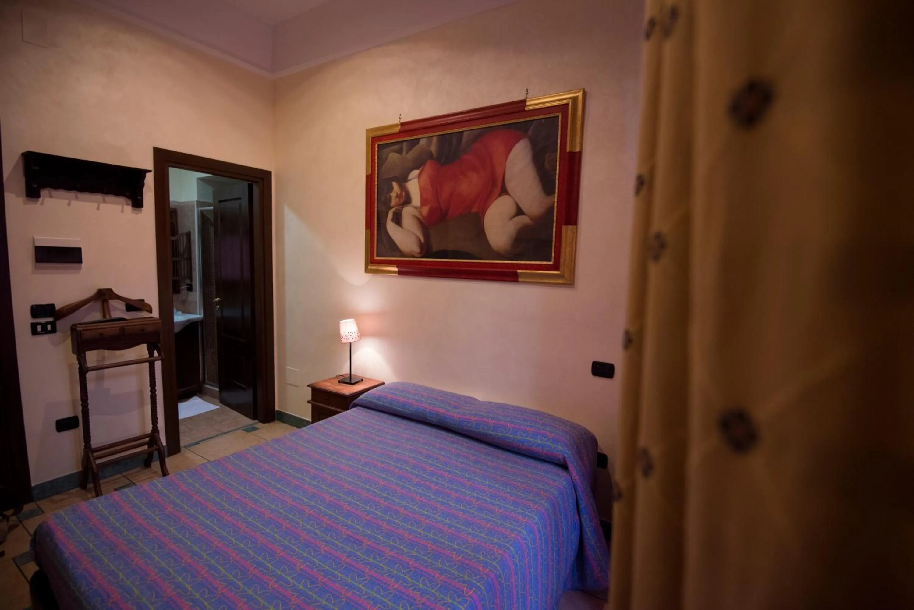 Bed in Schilizzi Hotel