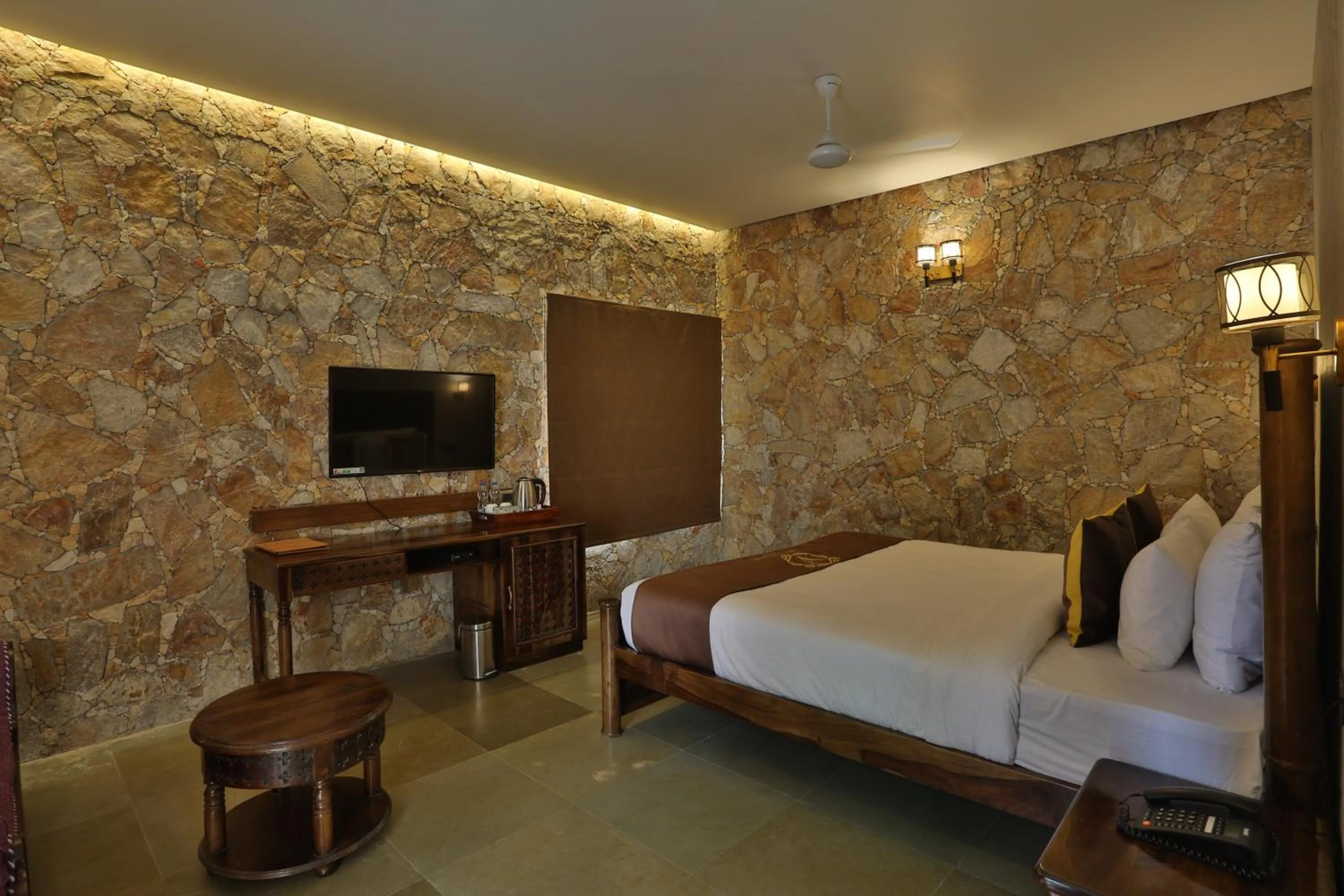 Bedroom, Bed in Vikrama Heritage Resort Pavagadh