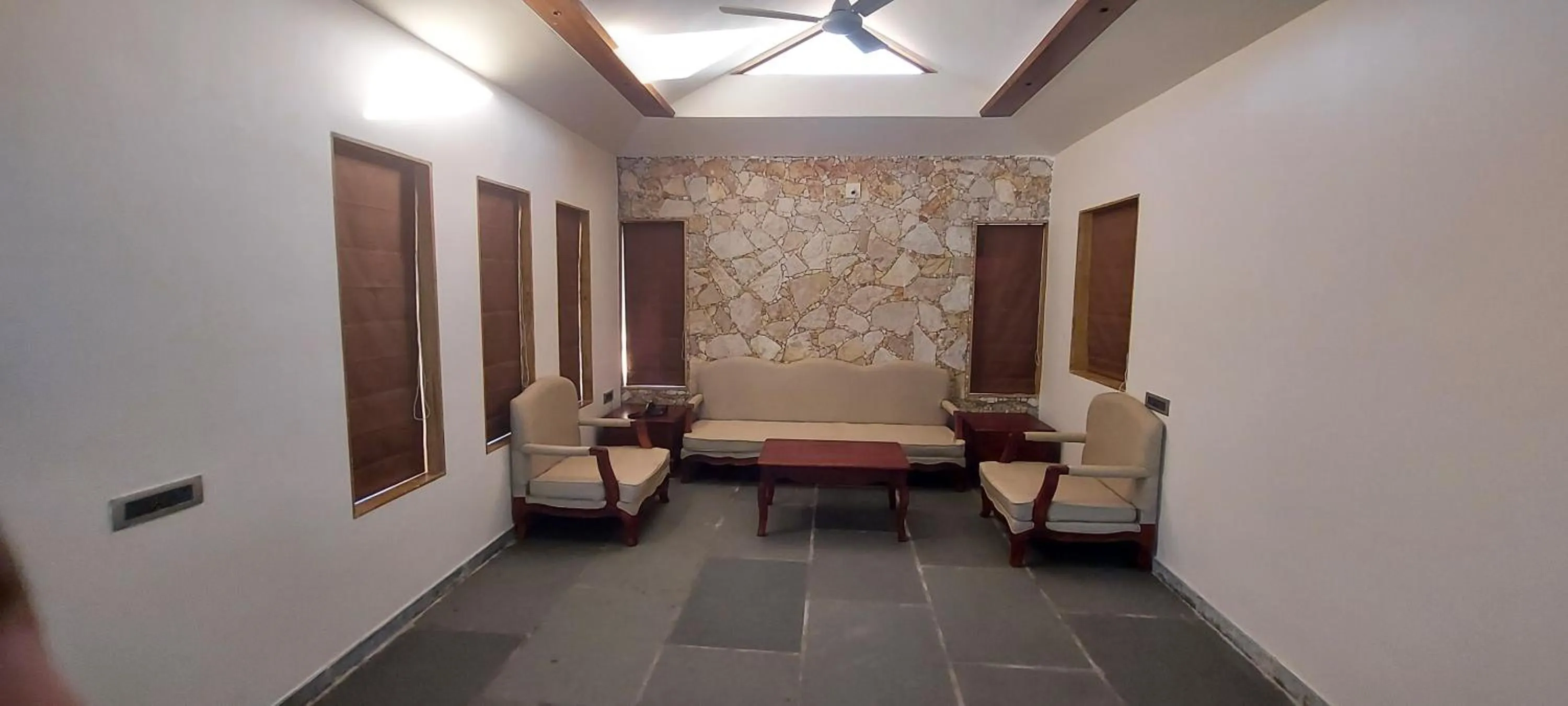 Living room, Bed in Vikrama Heritage Resort Pavagadh