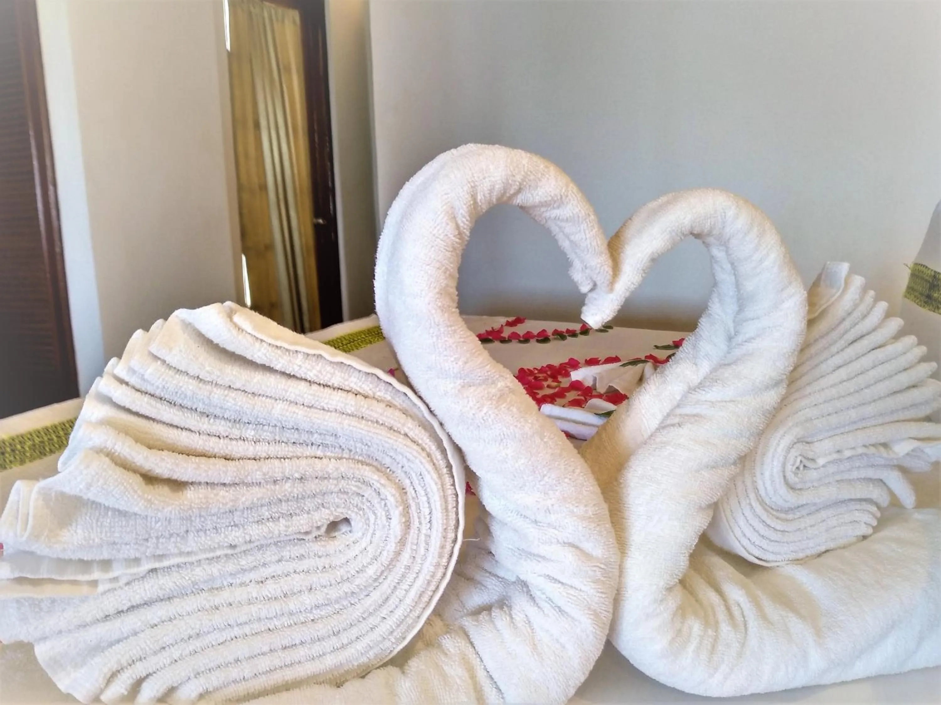 Bed in Emerald Sea Resort