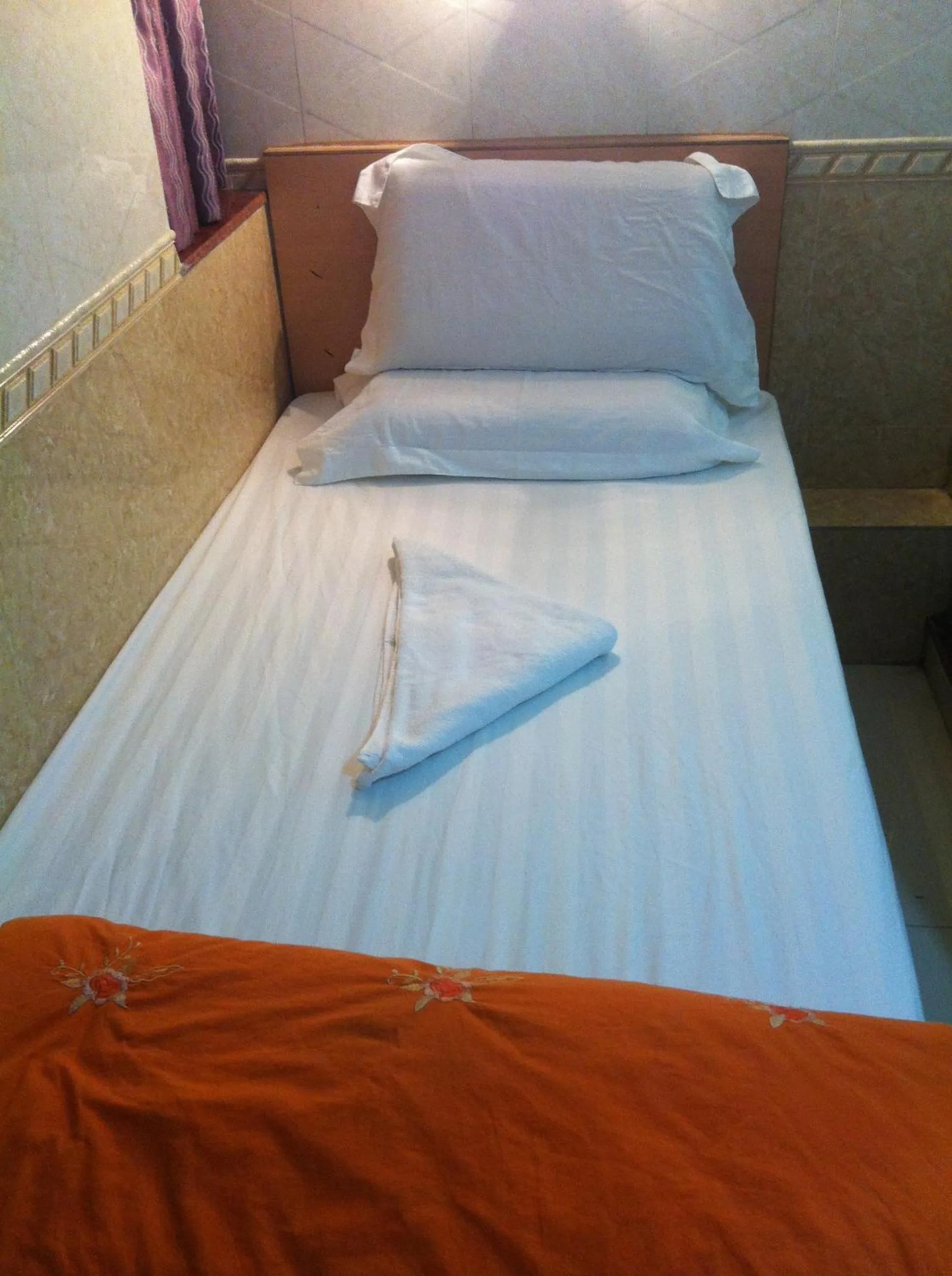 Bed in Everest Guest House