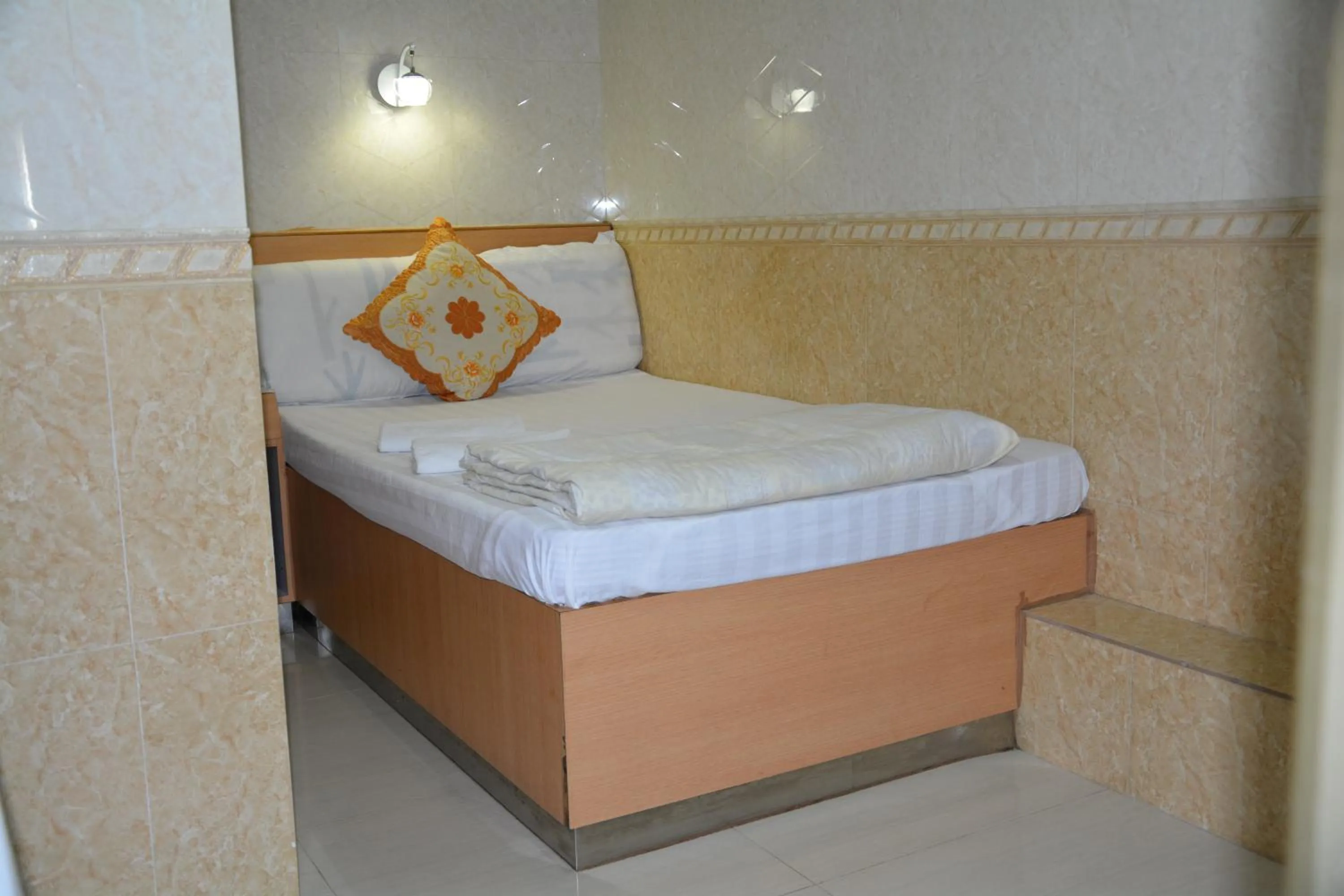 Living room, Bed in Everest Guest House