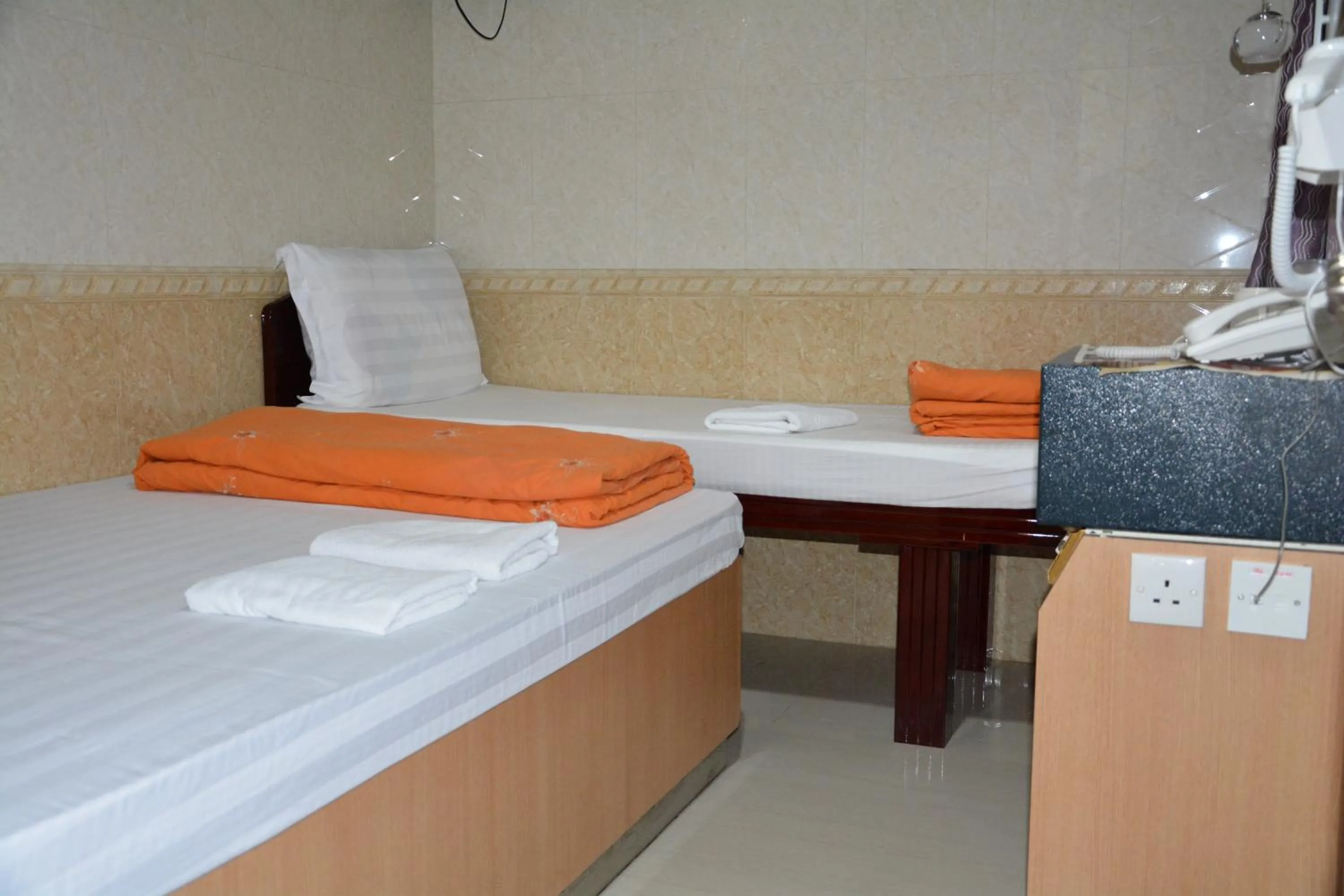 cot, Bed in Everest Guest House