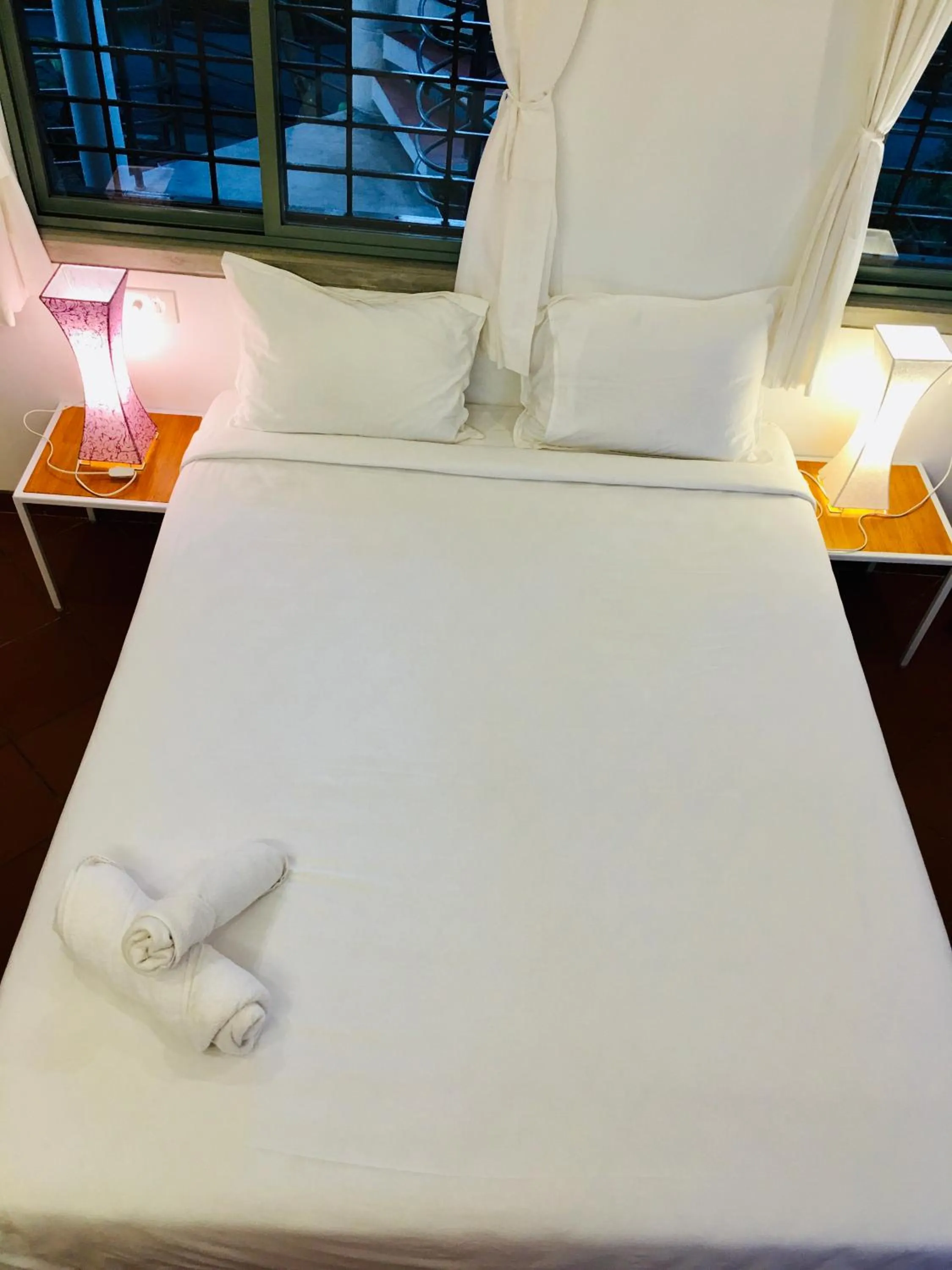 Bed in The Canopy Guest House