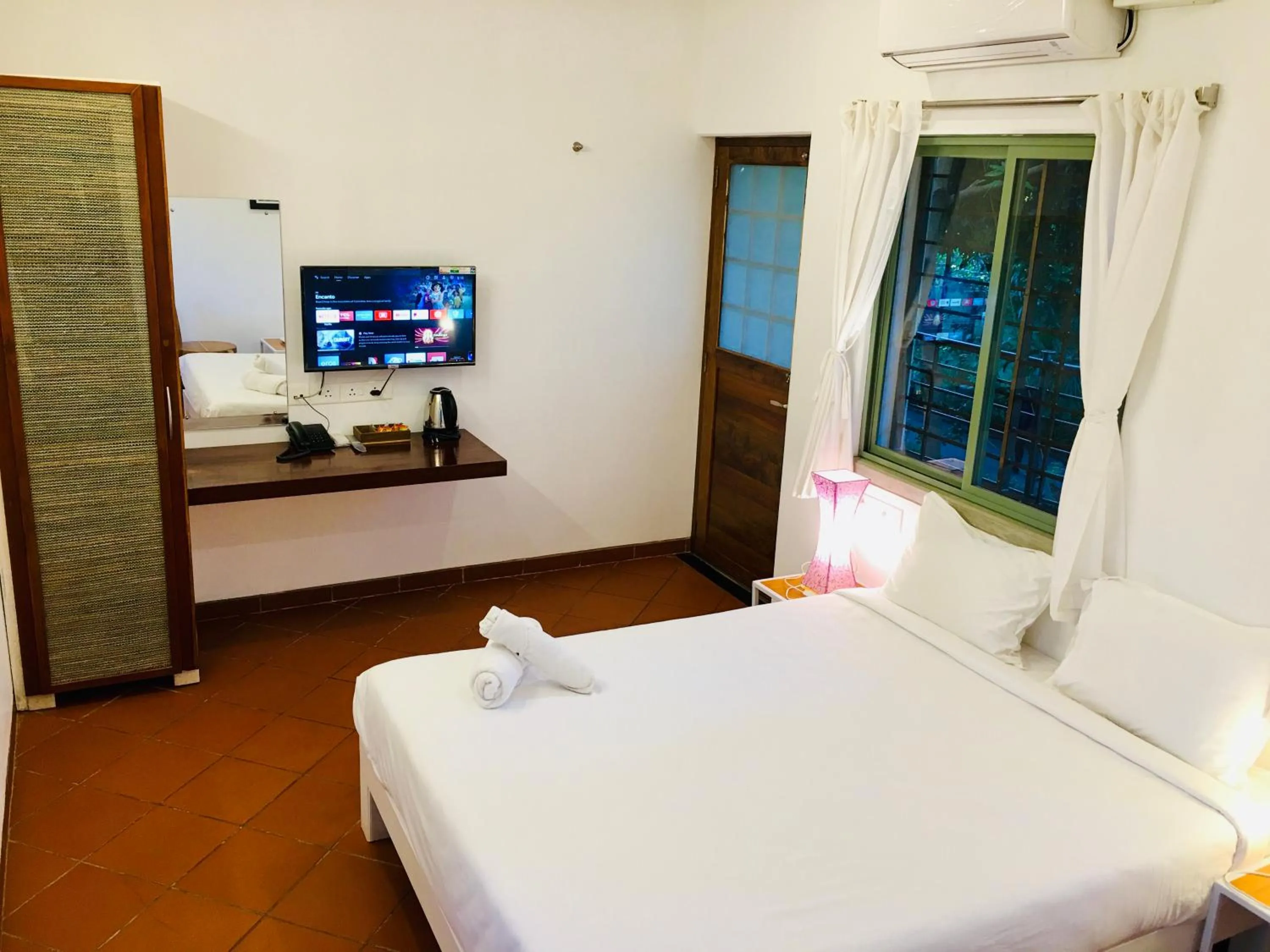 Bed in The Canopy Guest House