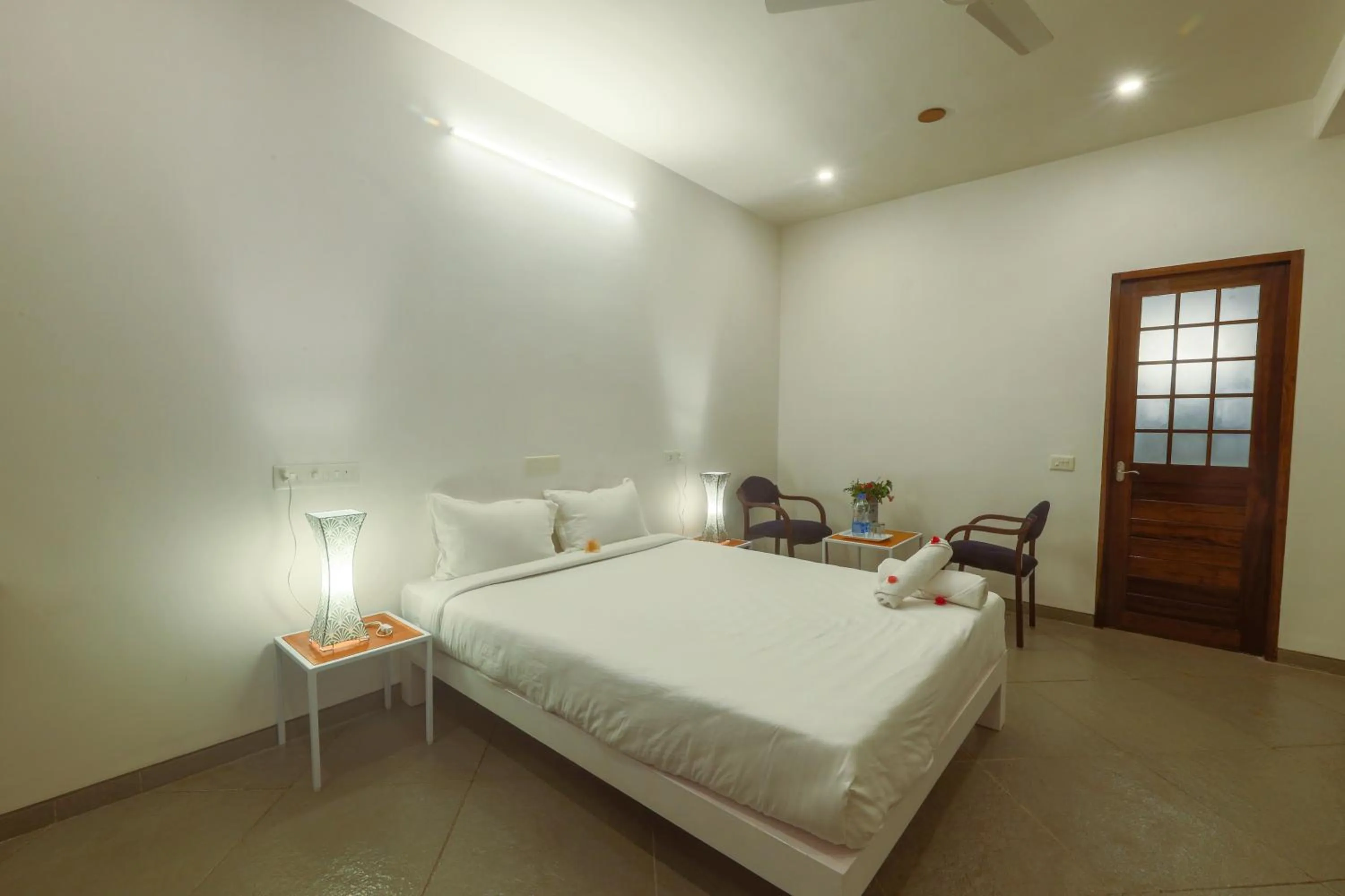 Bed in The Canopy Guest House