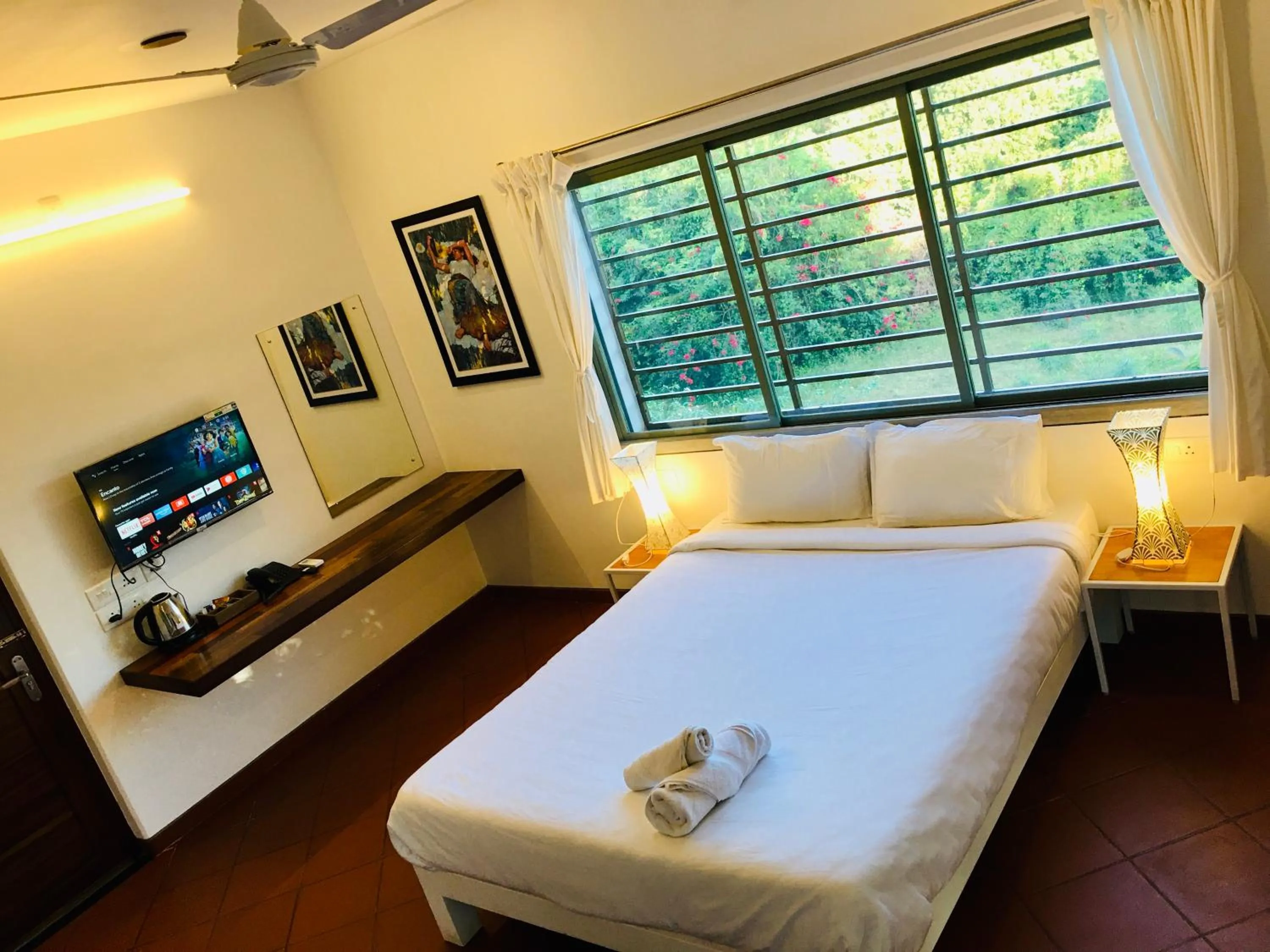 Bed in The Canopy Guest House